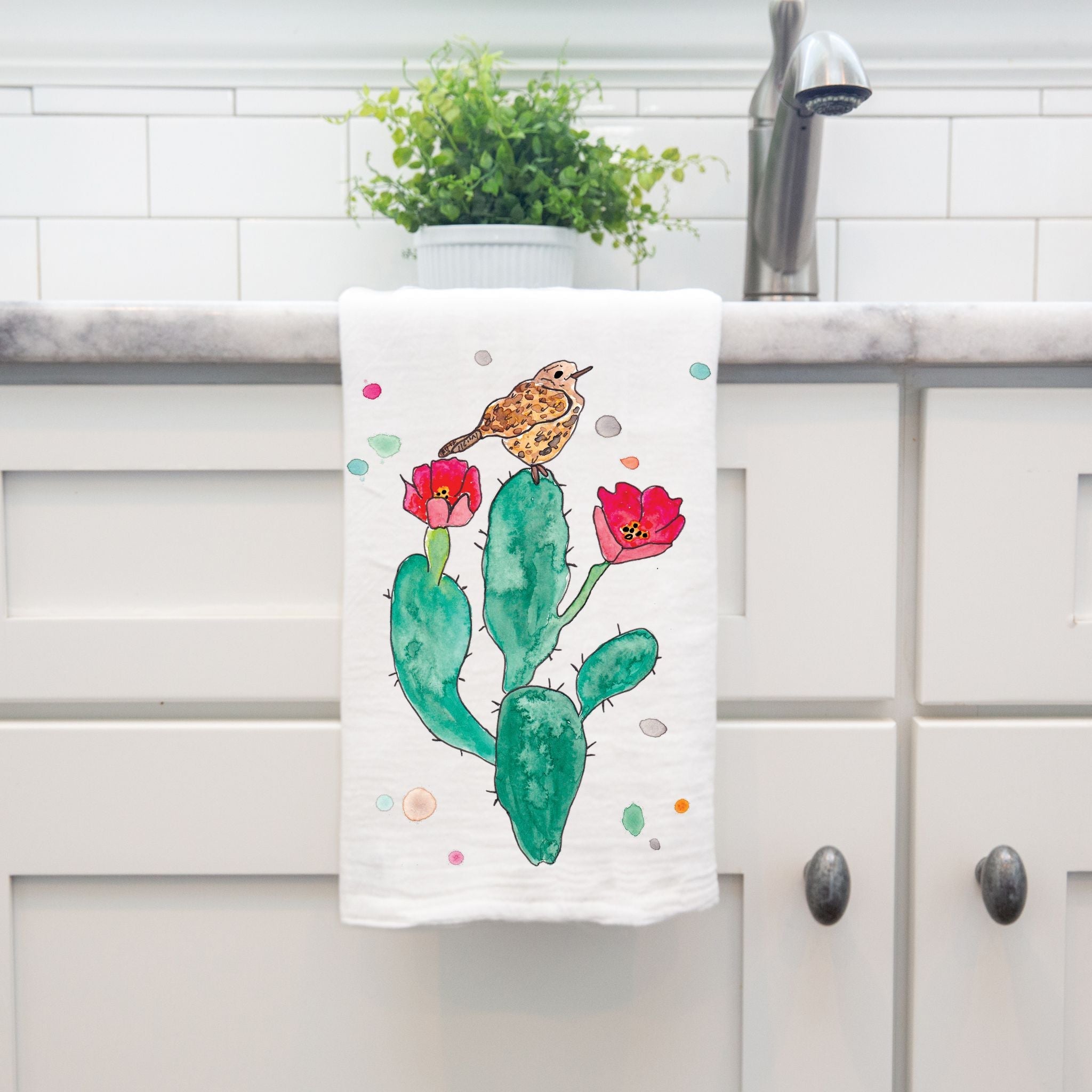 Flowering Cactus dish towel hanging by kitchen sink