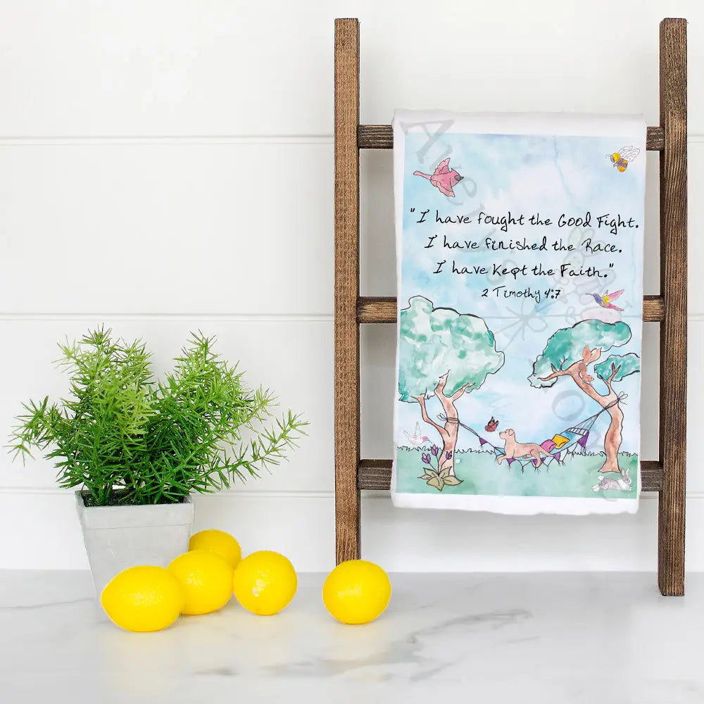 I Have Fought the Good Fight 2 Timothy 4:7 dish towel hanging in the kitchen