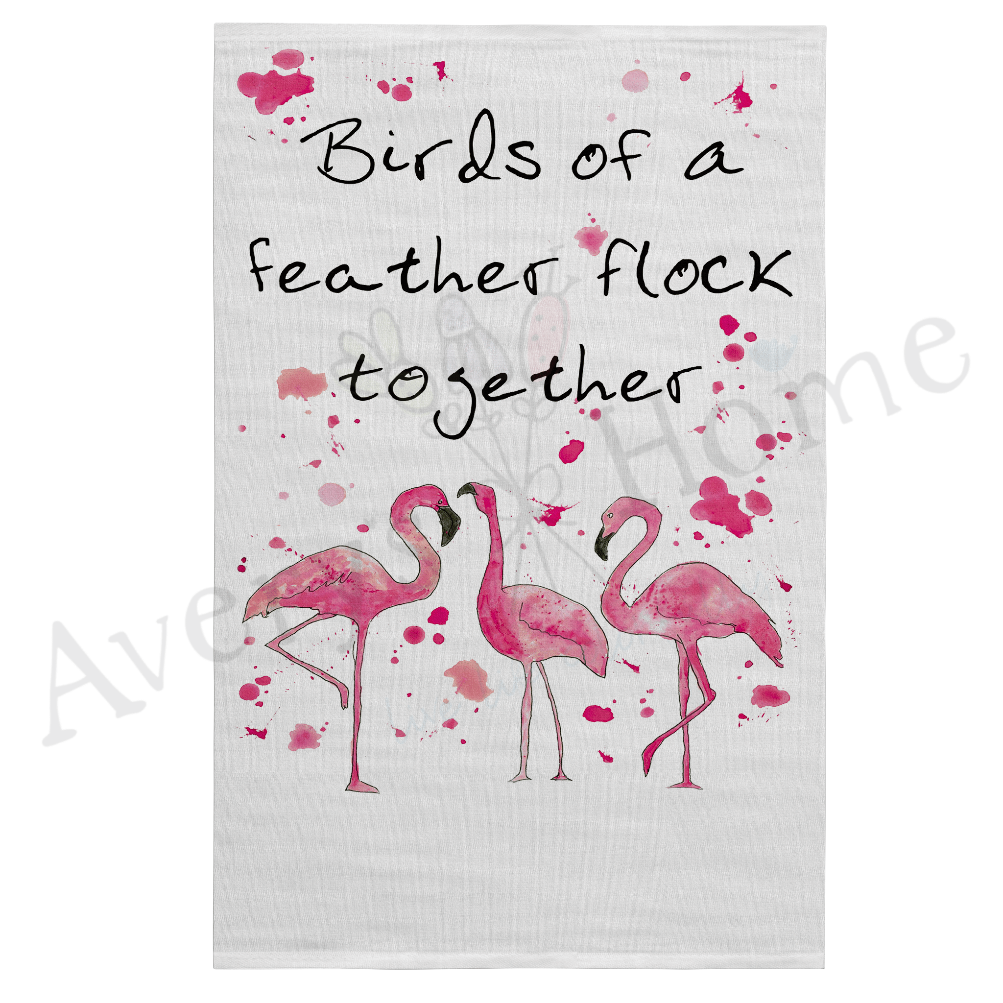 Birds of a Feather Flamingo dish towel hanging in the kitchen