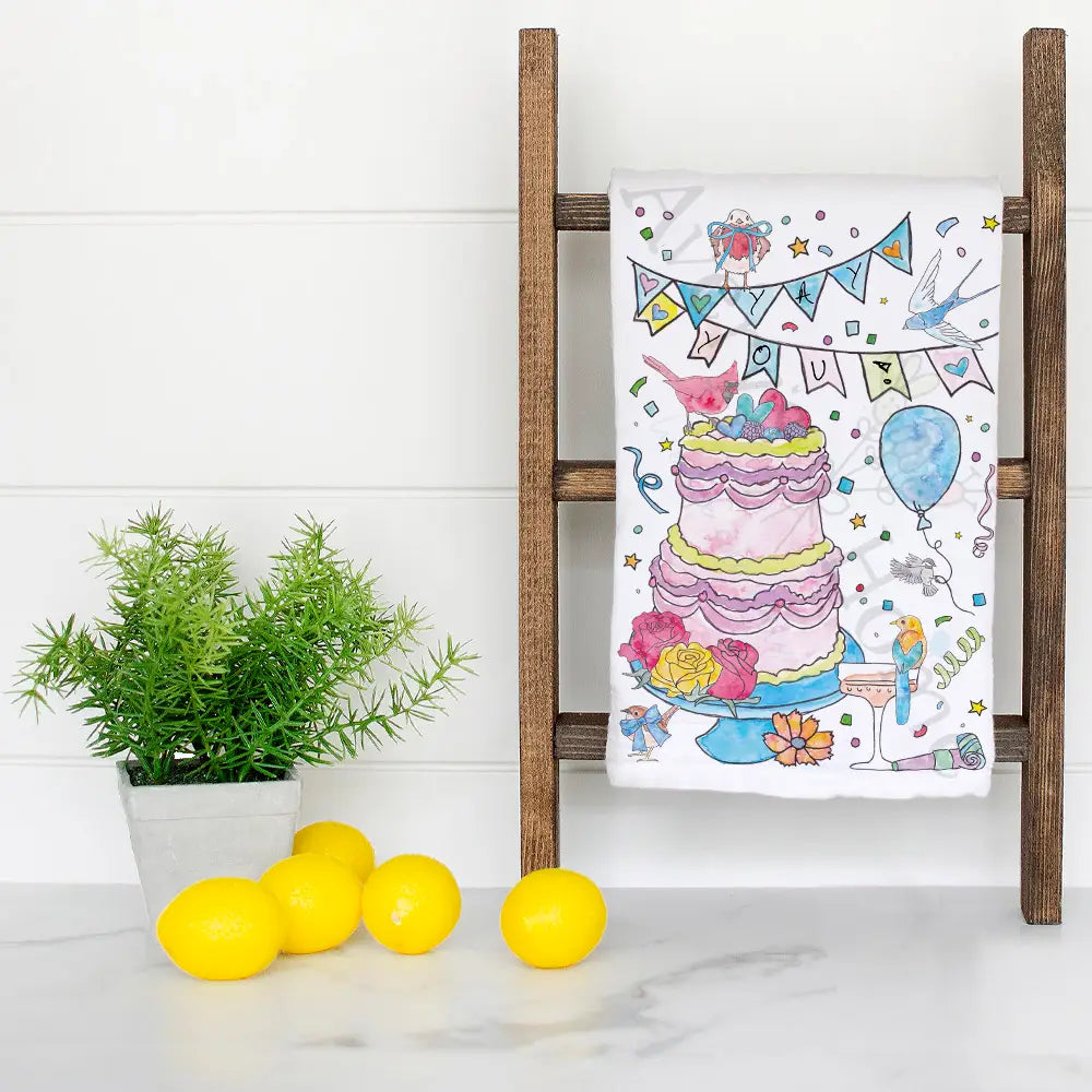 Celebration for You dish towel hanging in the kitchen