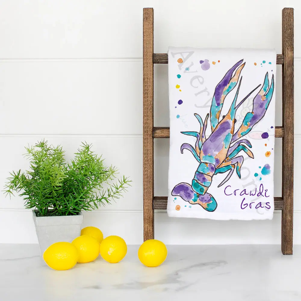Crawdi Gras dish towel hanging in the kitchen