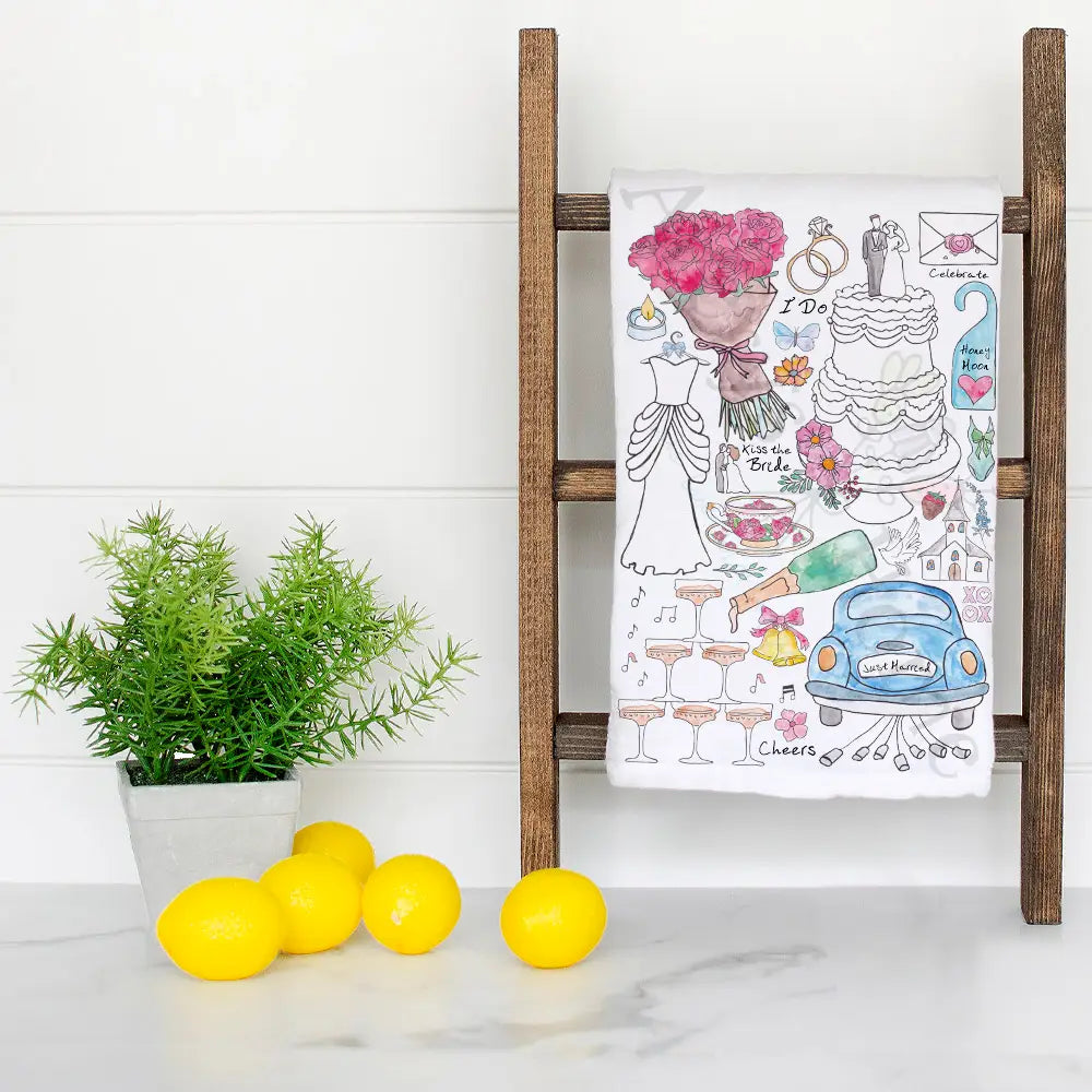 Wedding Day Celebration dish towel hanging in the kitchen