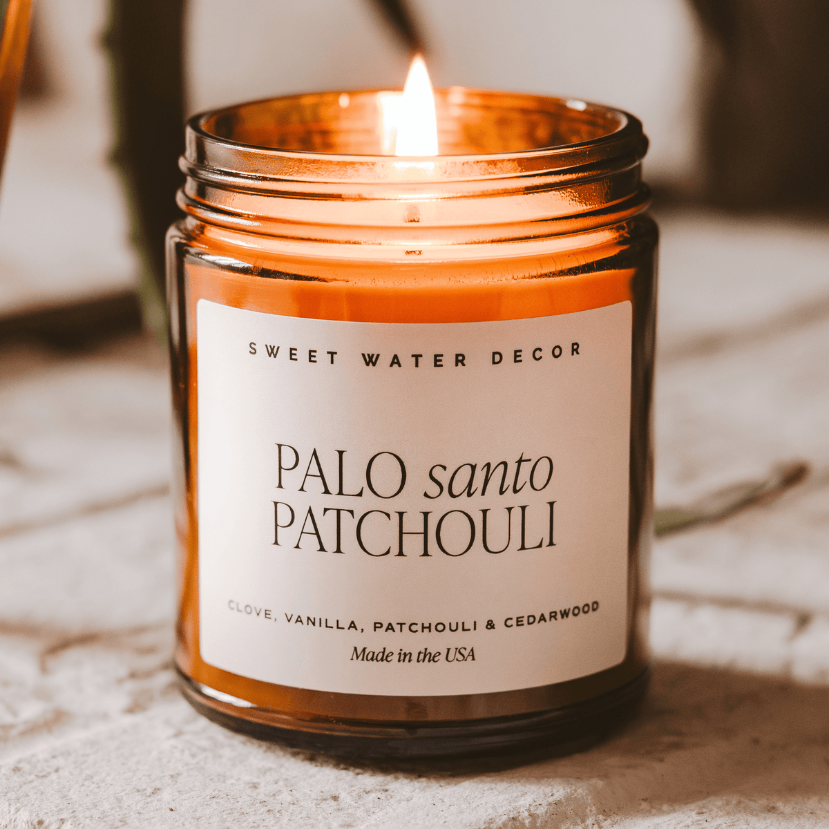 Palo Santo Patchouli Soy Candle - Amber Jar - 9 oz
