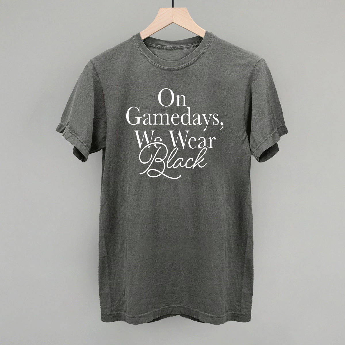 On Game Days We Wear Black design on a pepper Comfort Colors tee