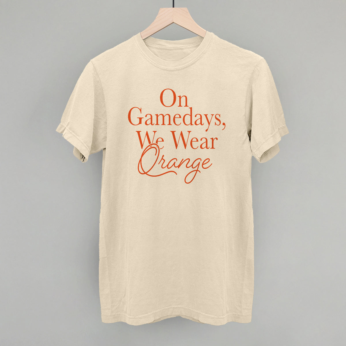 On Gamedays We Wear Orange design on an ivory Comfort Colors tee