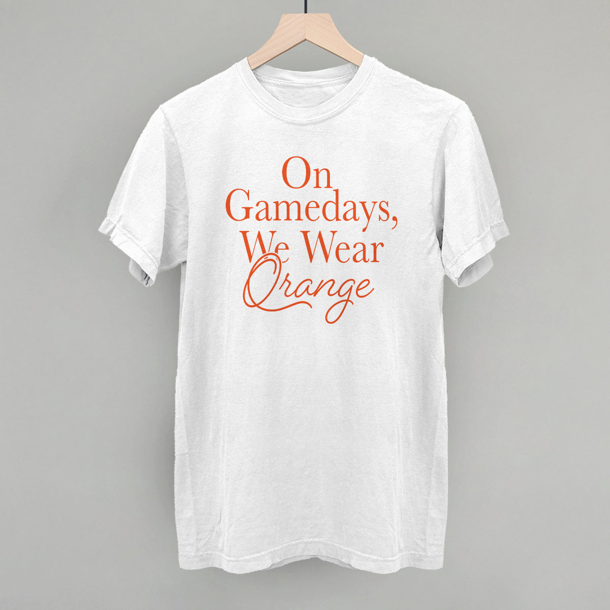 On Gamedays We Wear Orange design on a white Comfort Colors tee