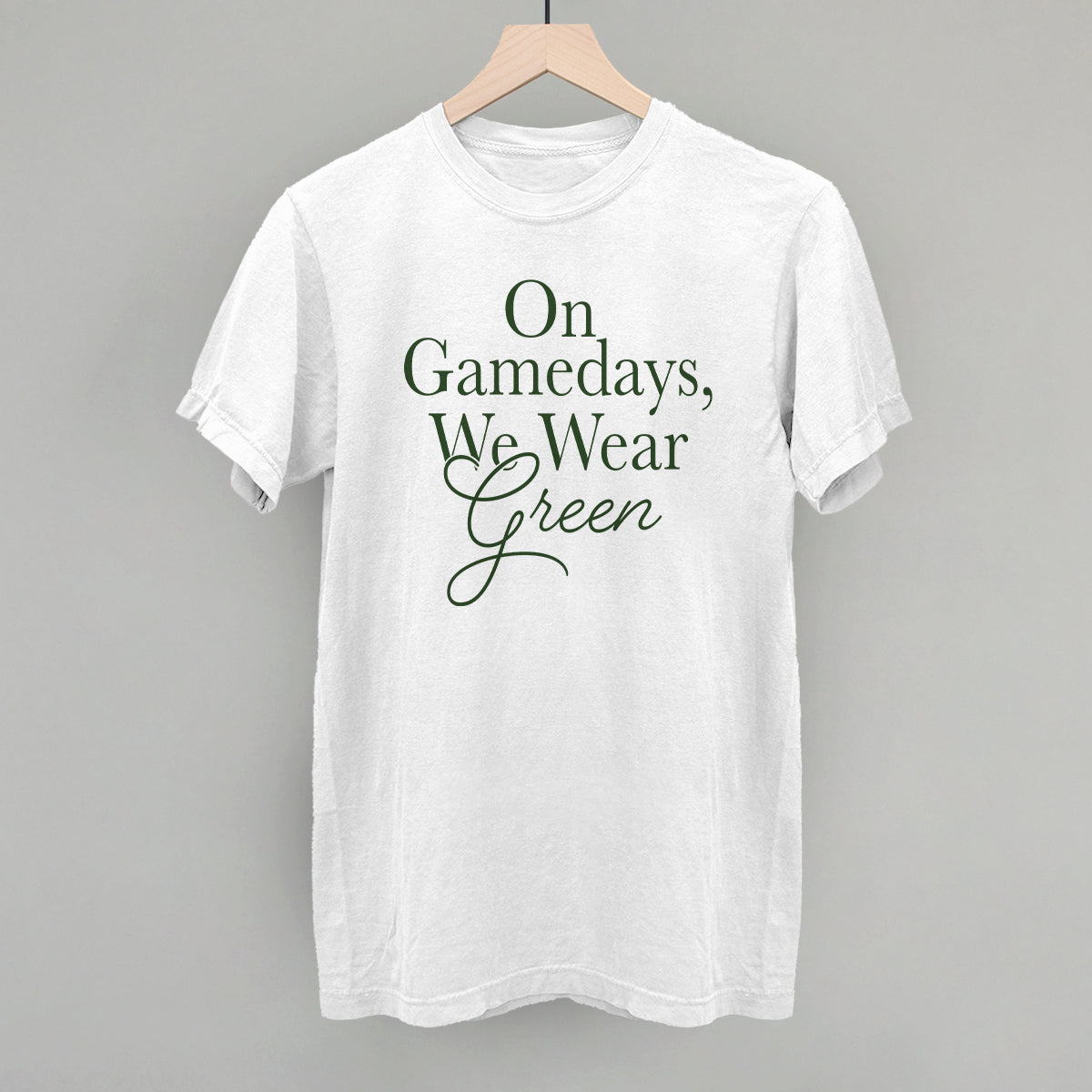 On Gamedays We Wear Green design on a white Comfort Colors tee