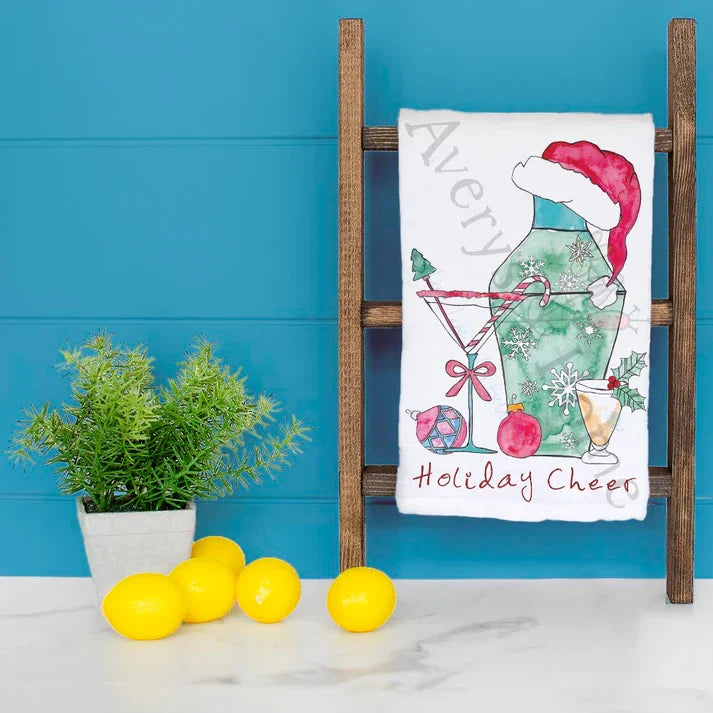 Holiday Cheer Christmas Cocktail dish towel hanging in the kitchen