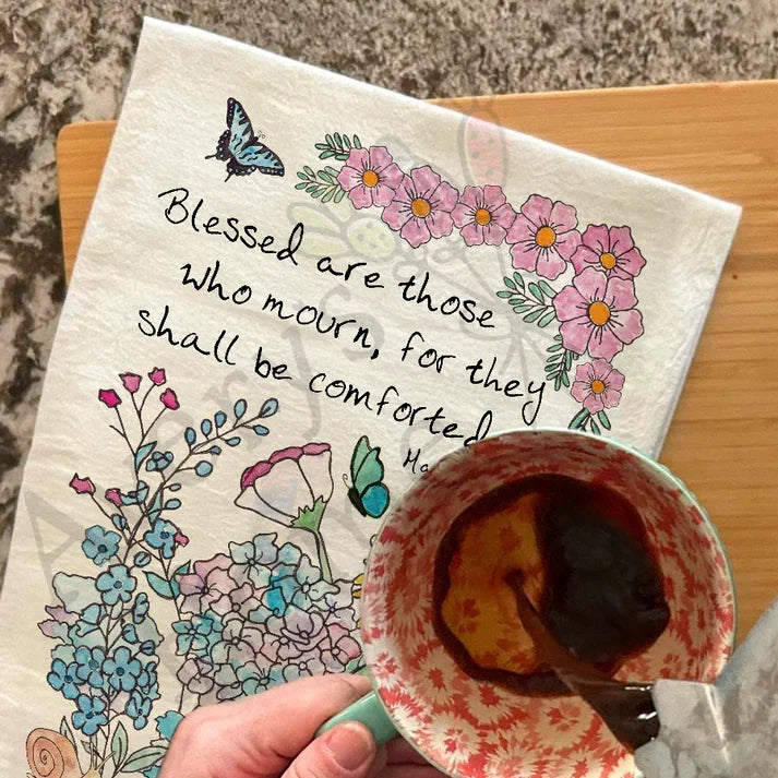 Blessed are Those Flowers Matthew 5:4 dish towel hanging in the kitchen