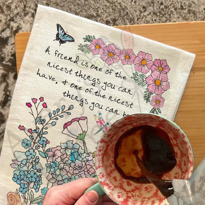Friendship and Flower Garden dish towel hanging in the kitchen