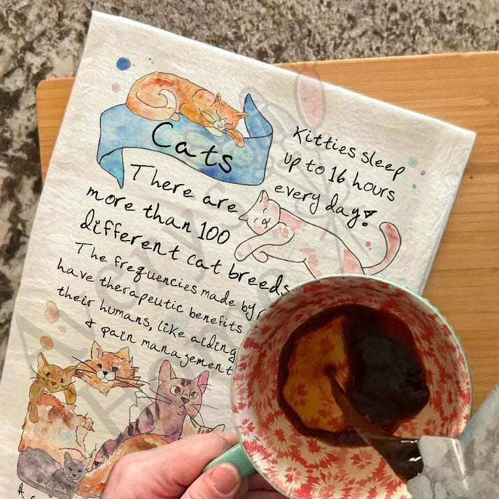 House Cat Facts dish towel hanging in the kitchen