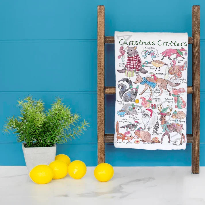 Christmas Critters dish towel hanging in the kitchen