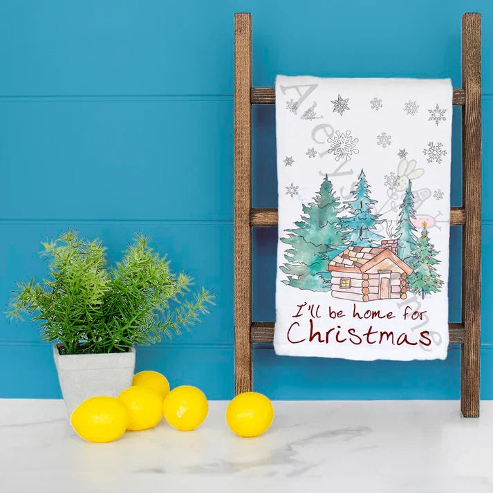I'll Be Home for Christmas dish towel hanging in the kitchen