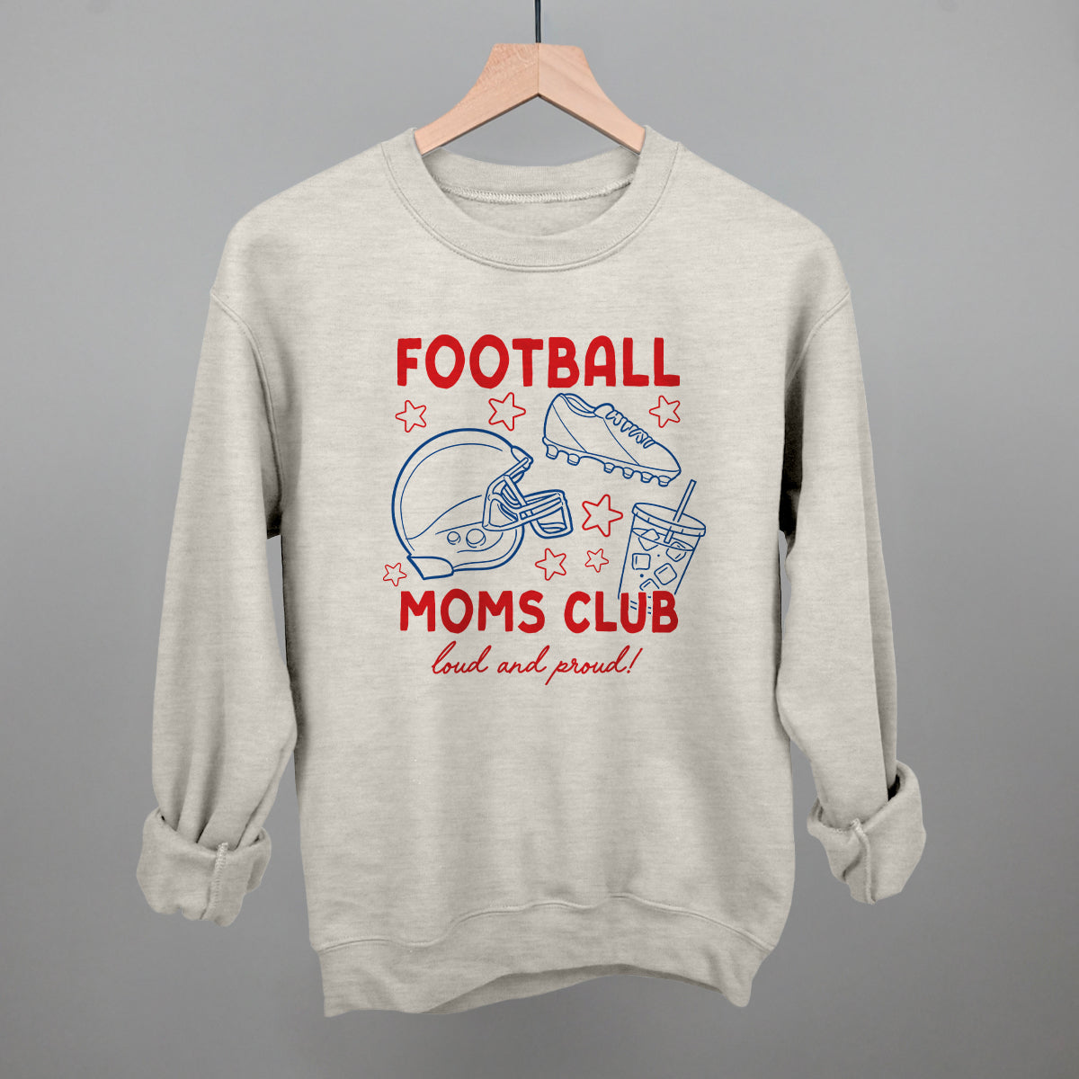 Football Moms Club doodle design on an oatmeal crewneck sweatshirt