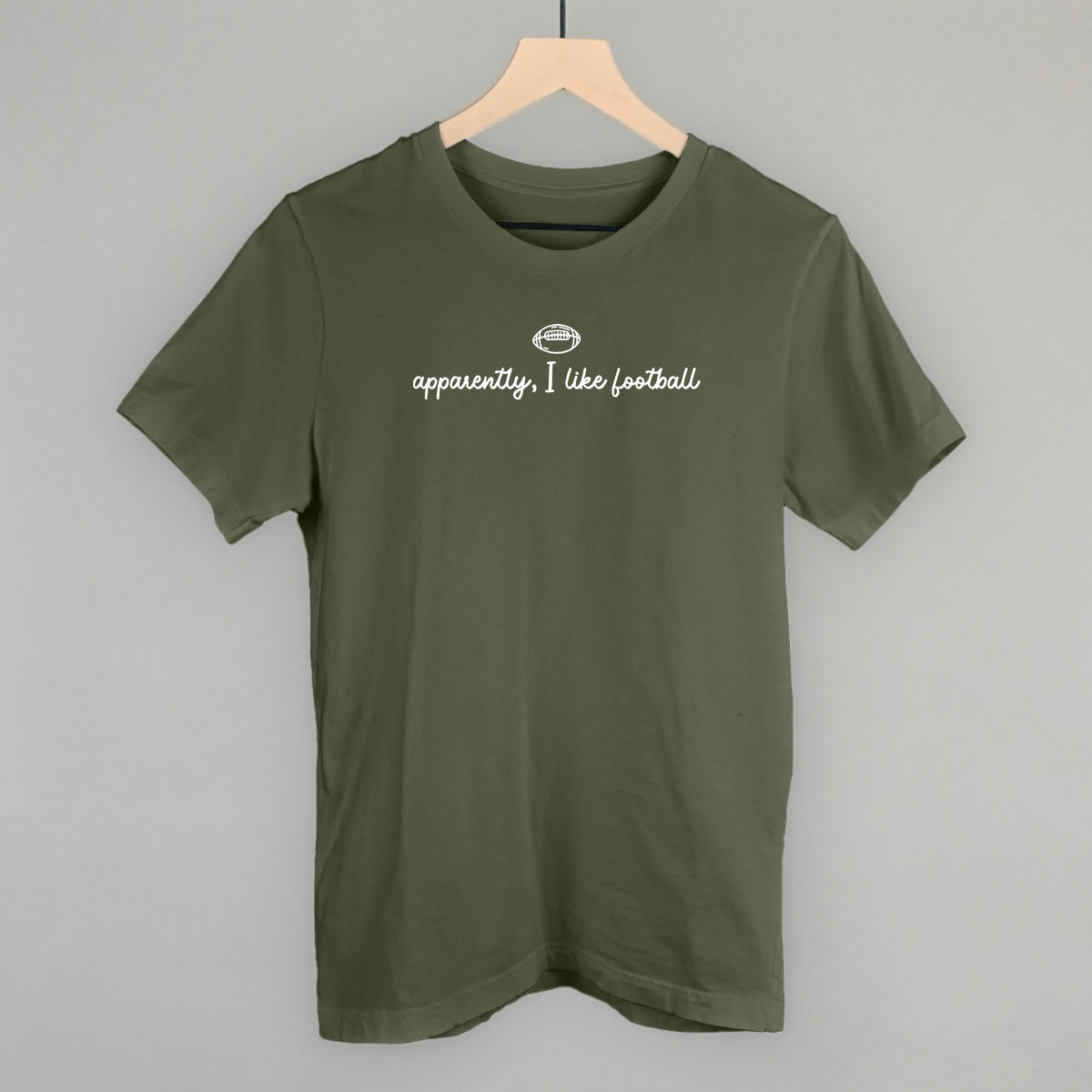 Apparently I Like Football design on a military green cotton tee