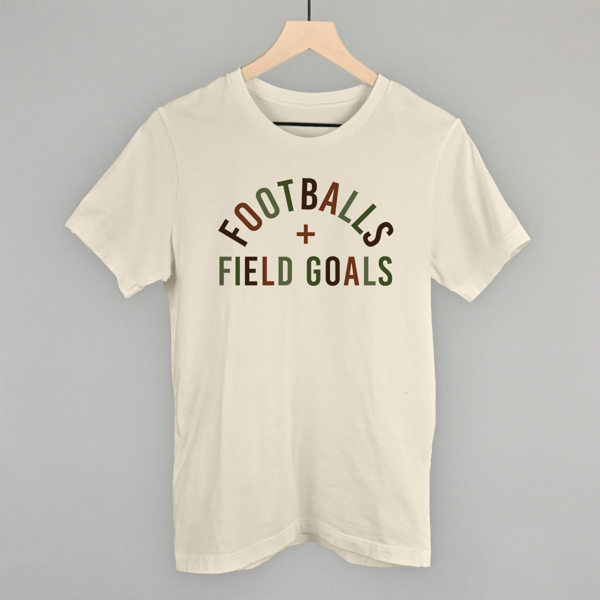 Footballs And Field Goals design on a natural cotton tee
