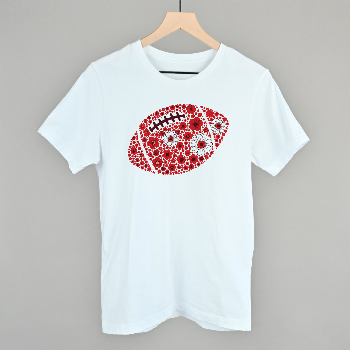Red floral football design on a white cotton tee