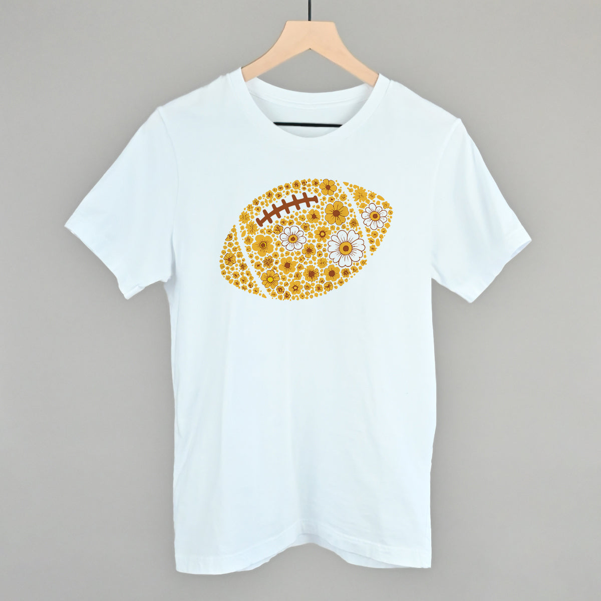 Yellow floral football design on a white cotton tee