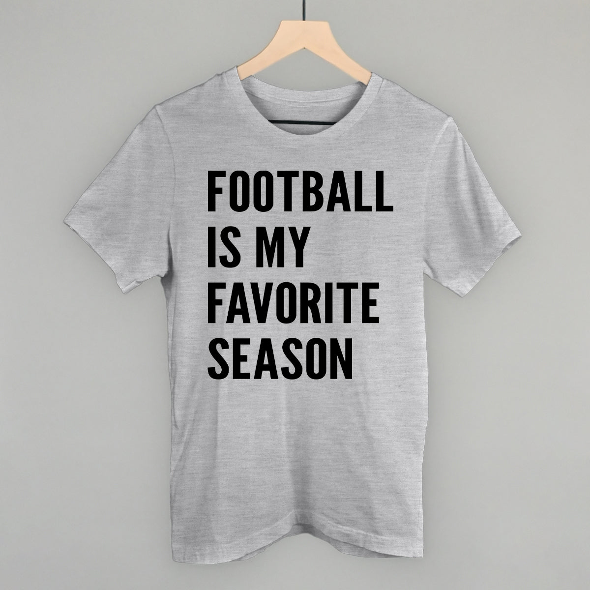 Football Is My Favorite Season design on an athletic heather cotton tee
