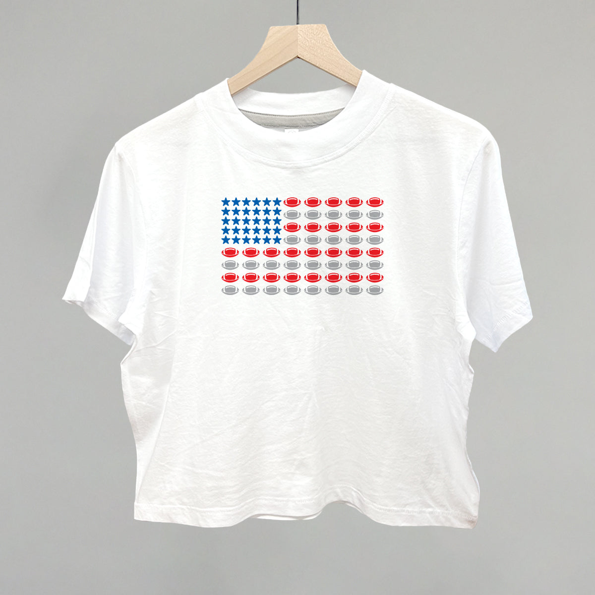 Football American flag design on a white boxy tee