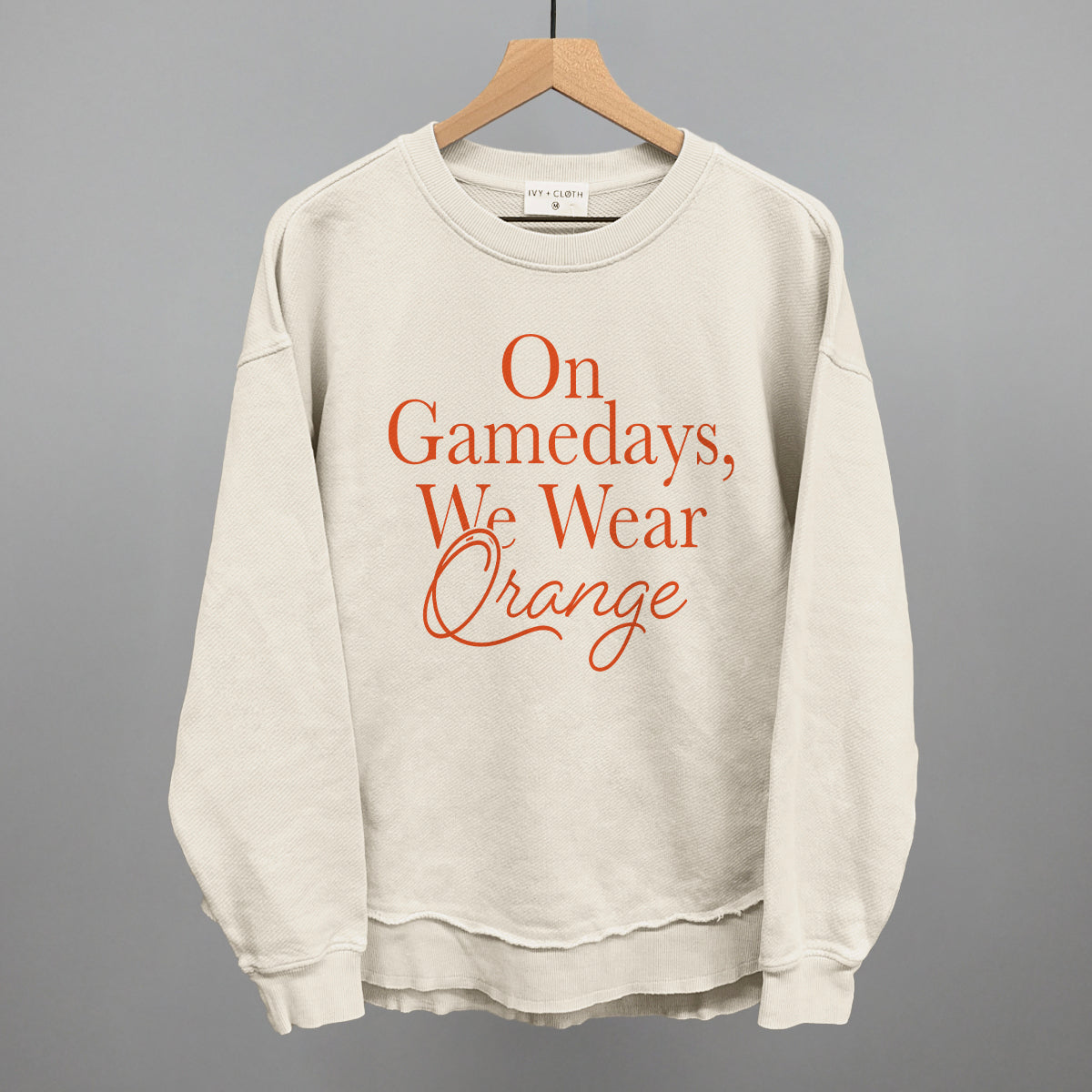 On Gamedays We Wear Orange design shown in tapioca