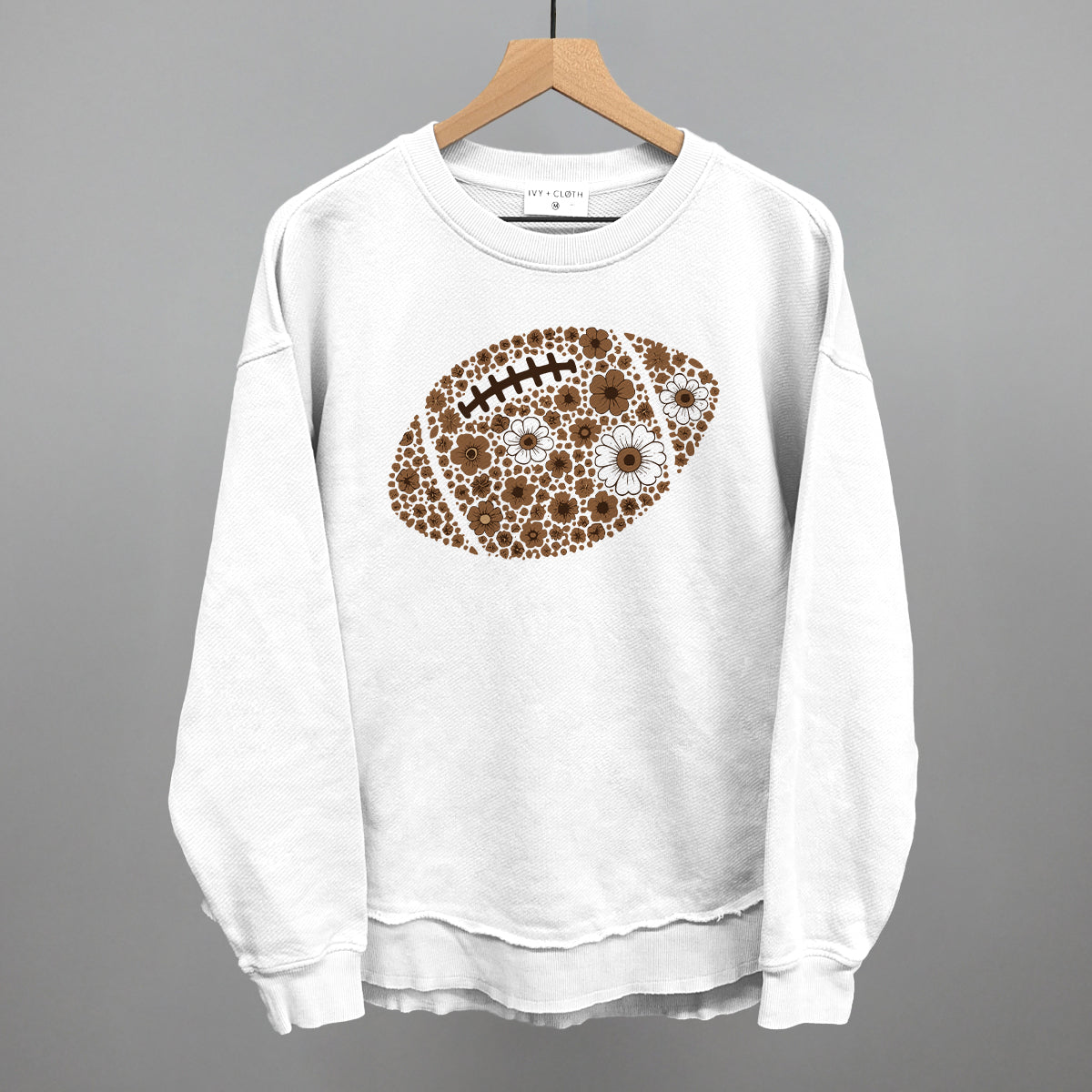 Brown floral football design shown in white