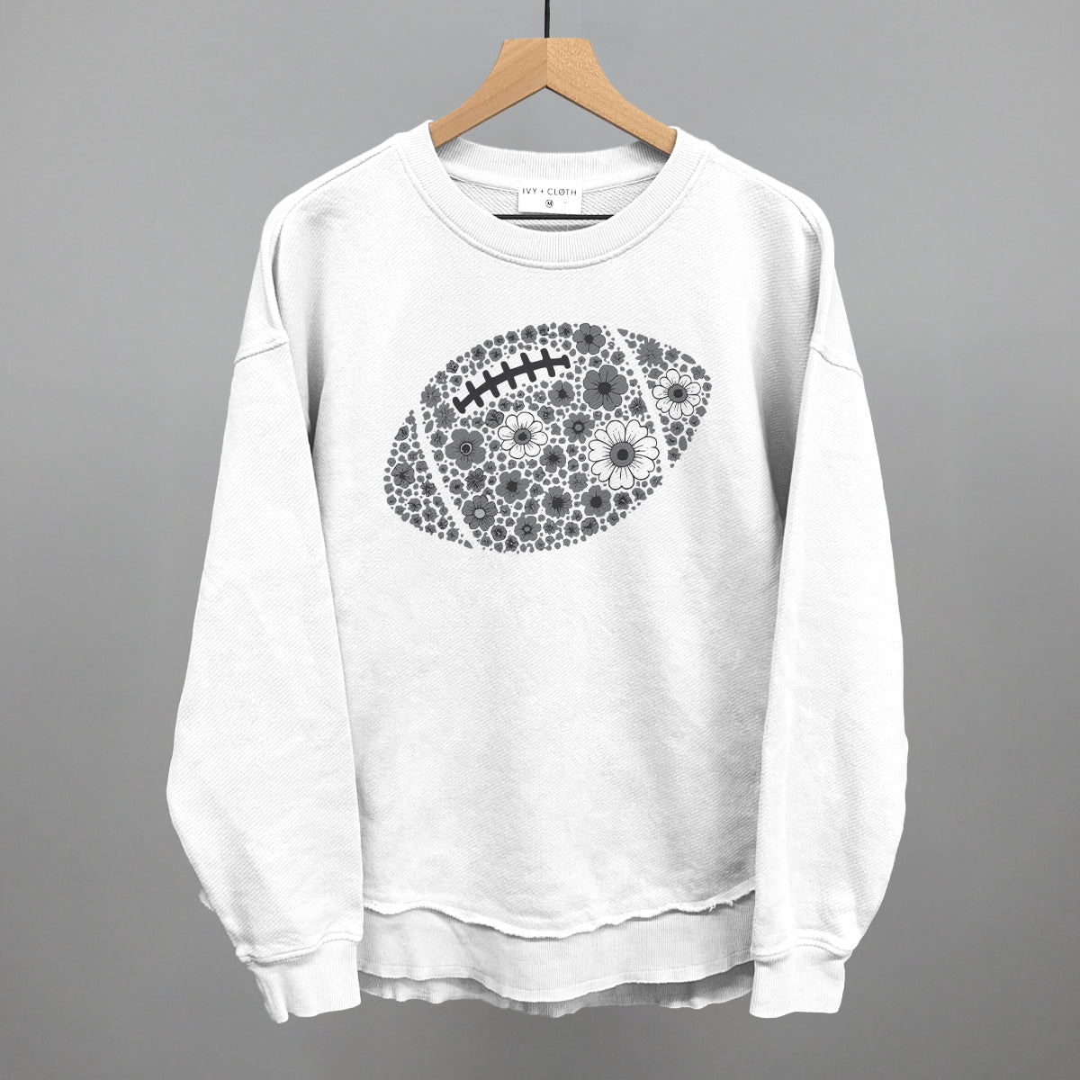 Grey floral football design shown in white