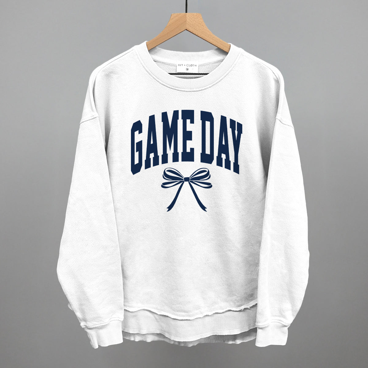 Game Day arch and bow design shown in white