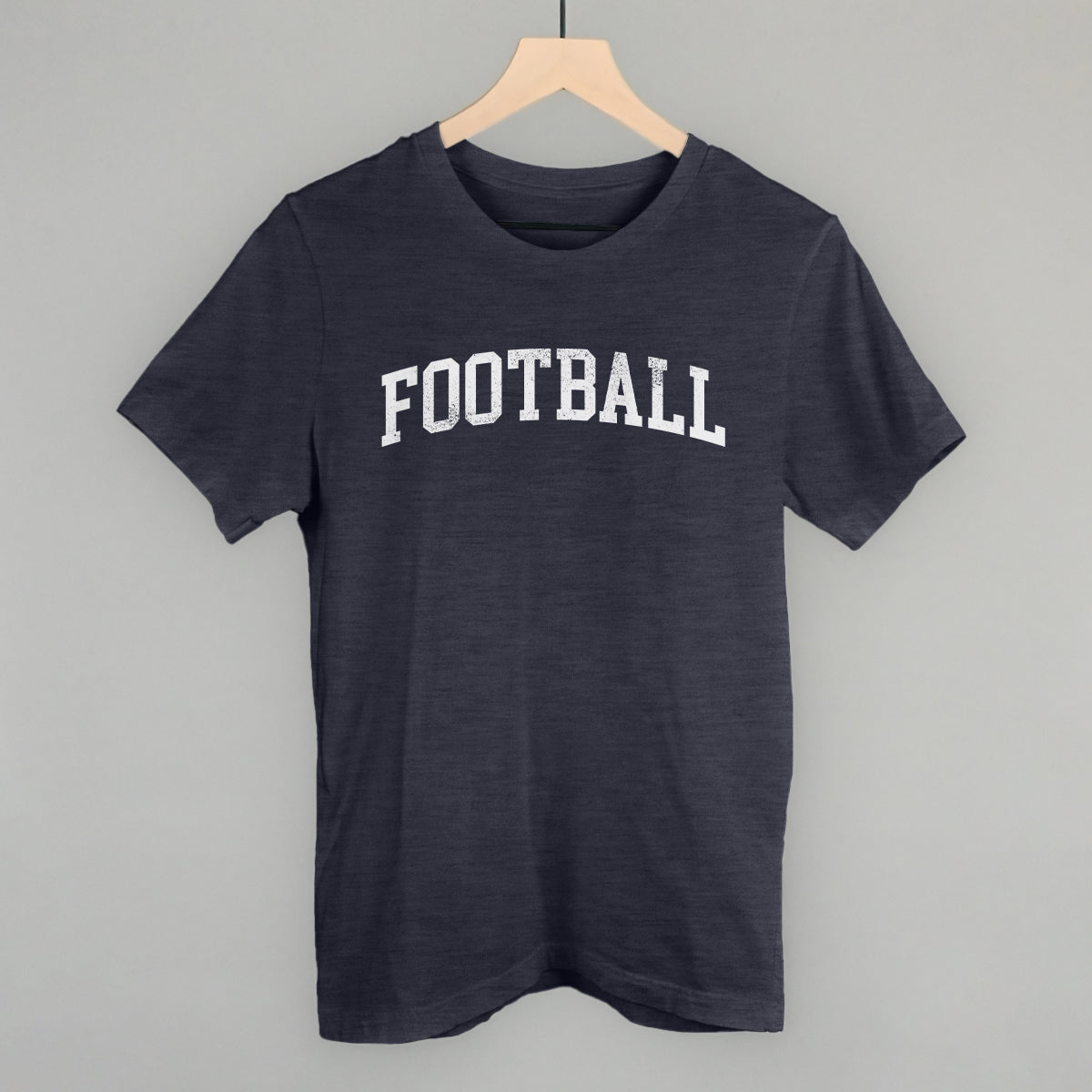 Distressed collegiate football design on a heather navy cotton tee
