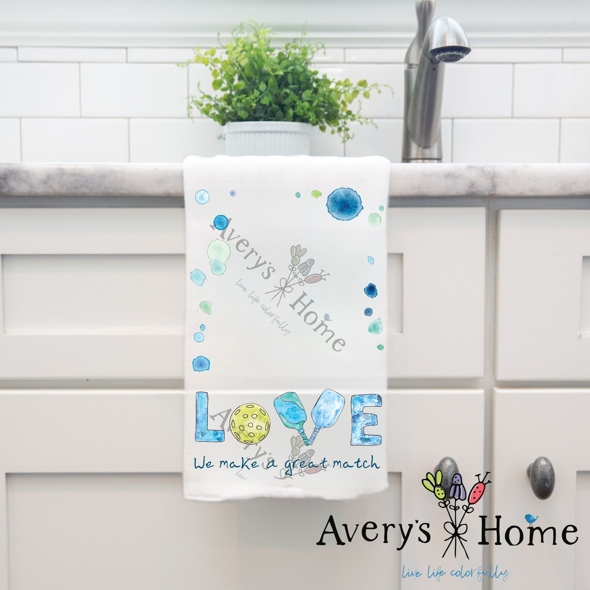 We Make a Great Match Pickleball dish towel hanging in the kitchen