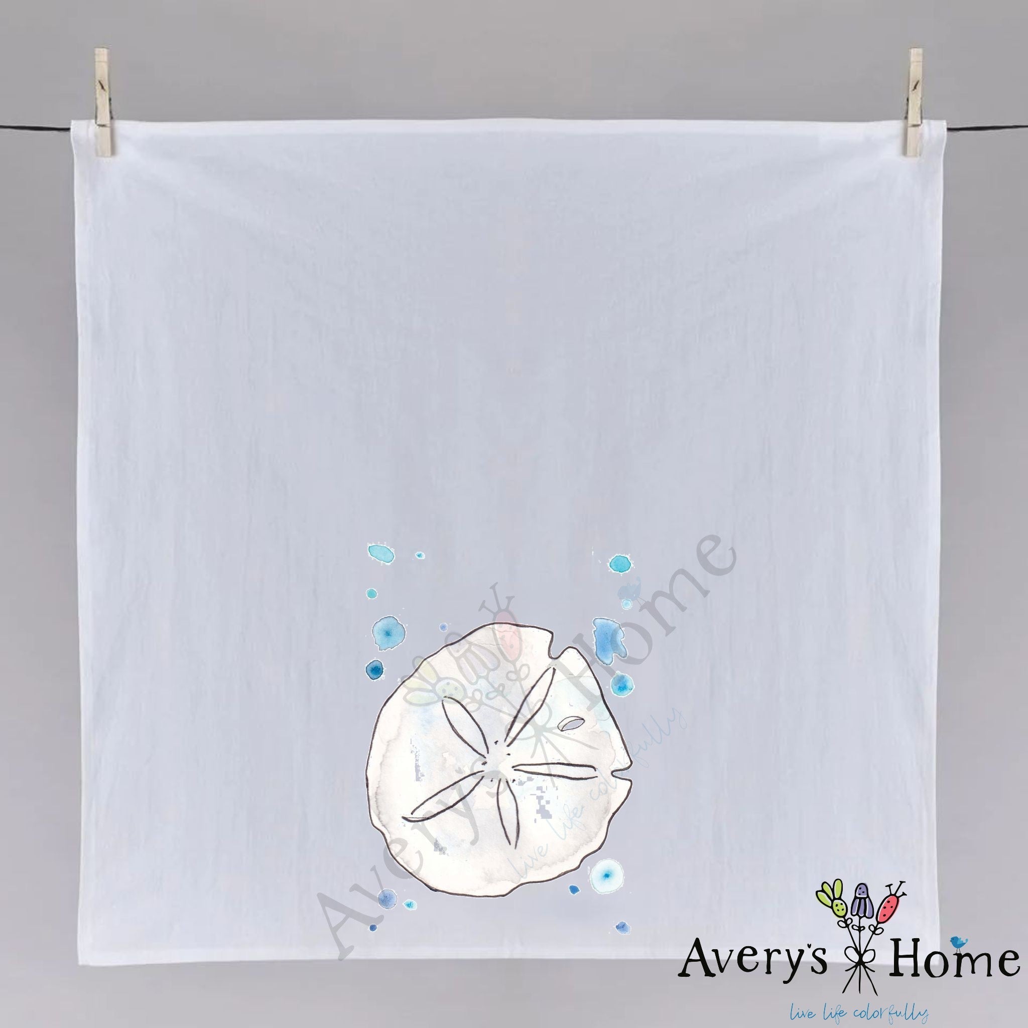 Sand Dollar dish towel hanging in the kitchen