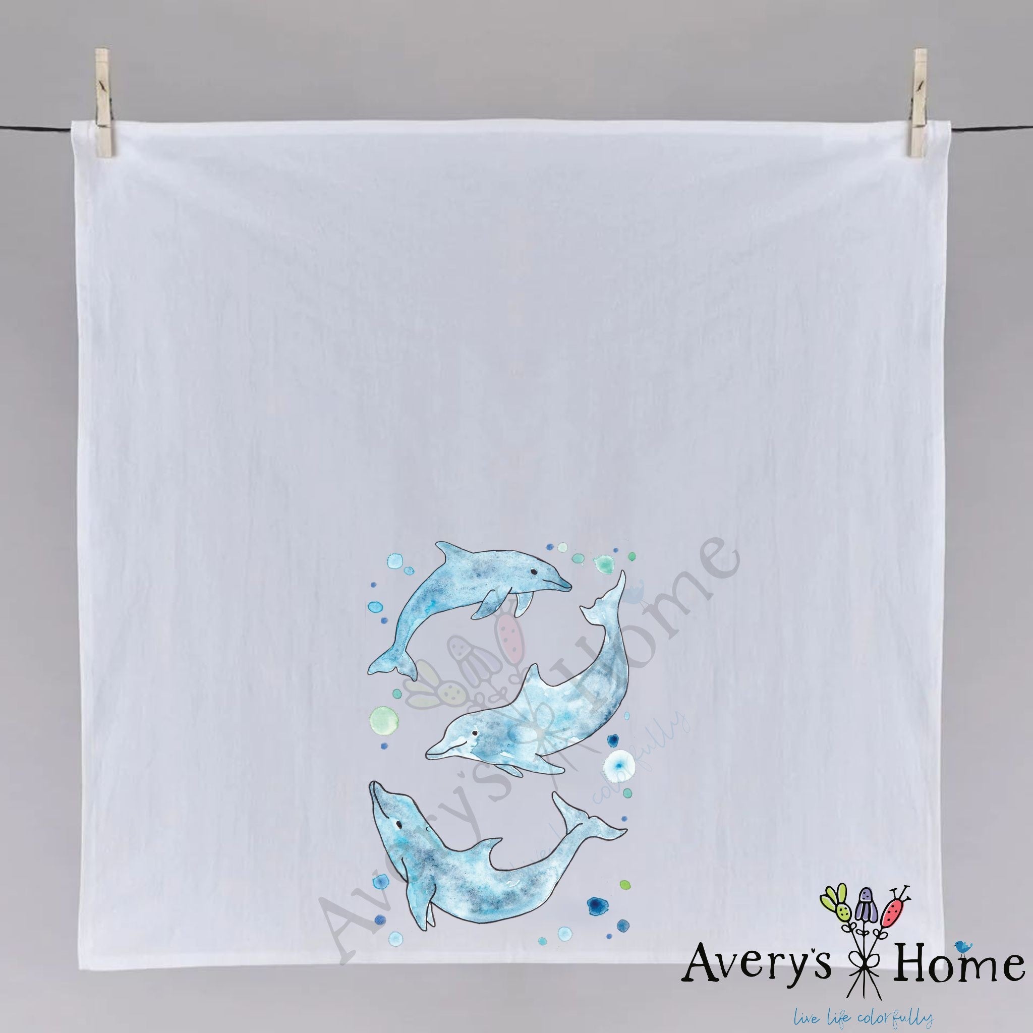 Dolphins dish towel folded, hemmed on all four sides