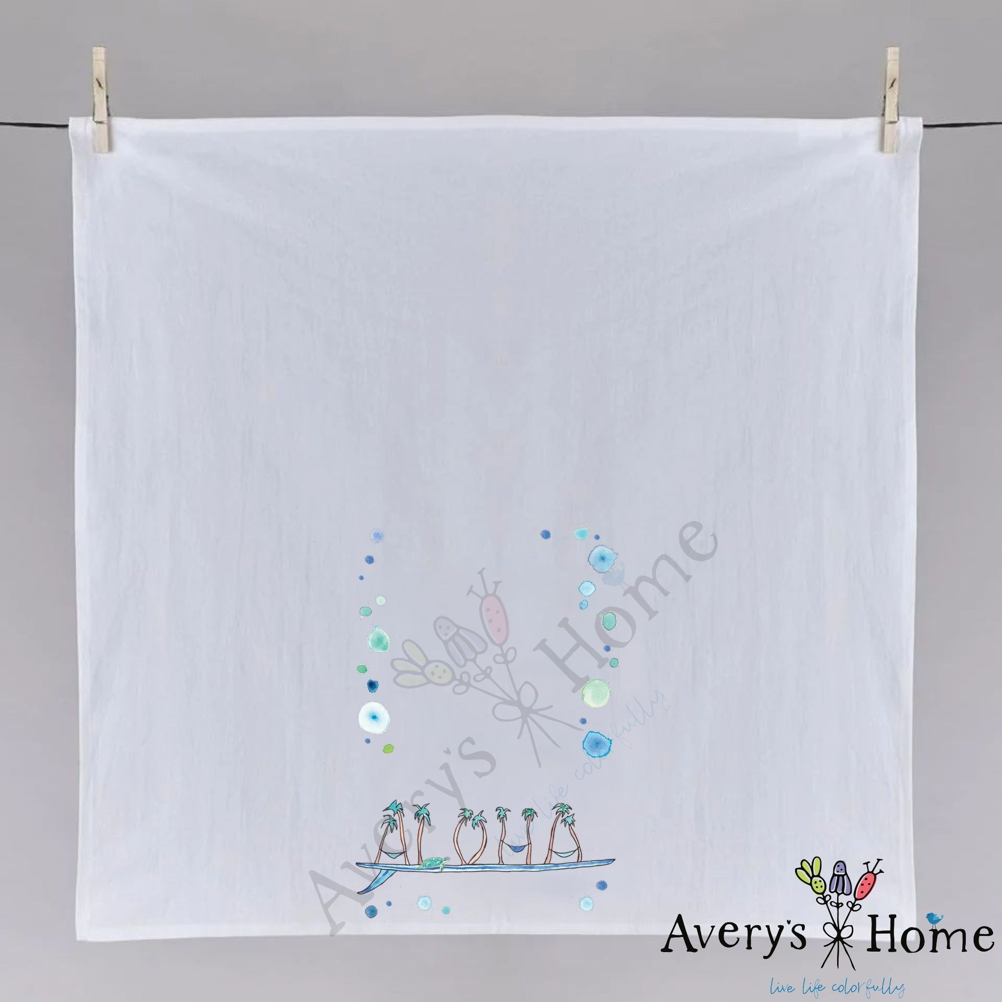 Aloha Surfboard dish towel hanging in the kitchen