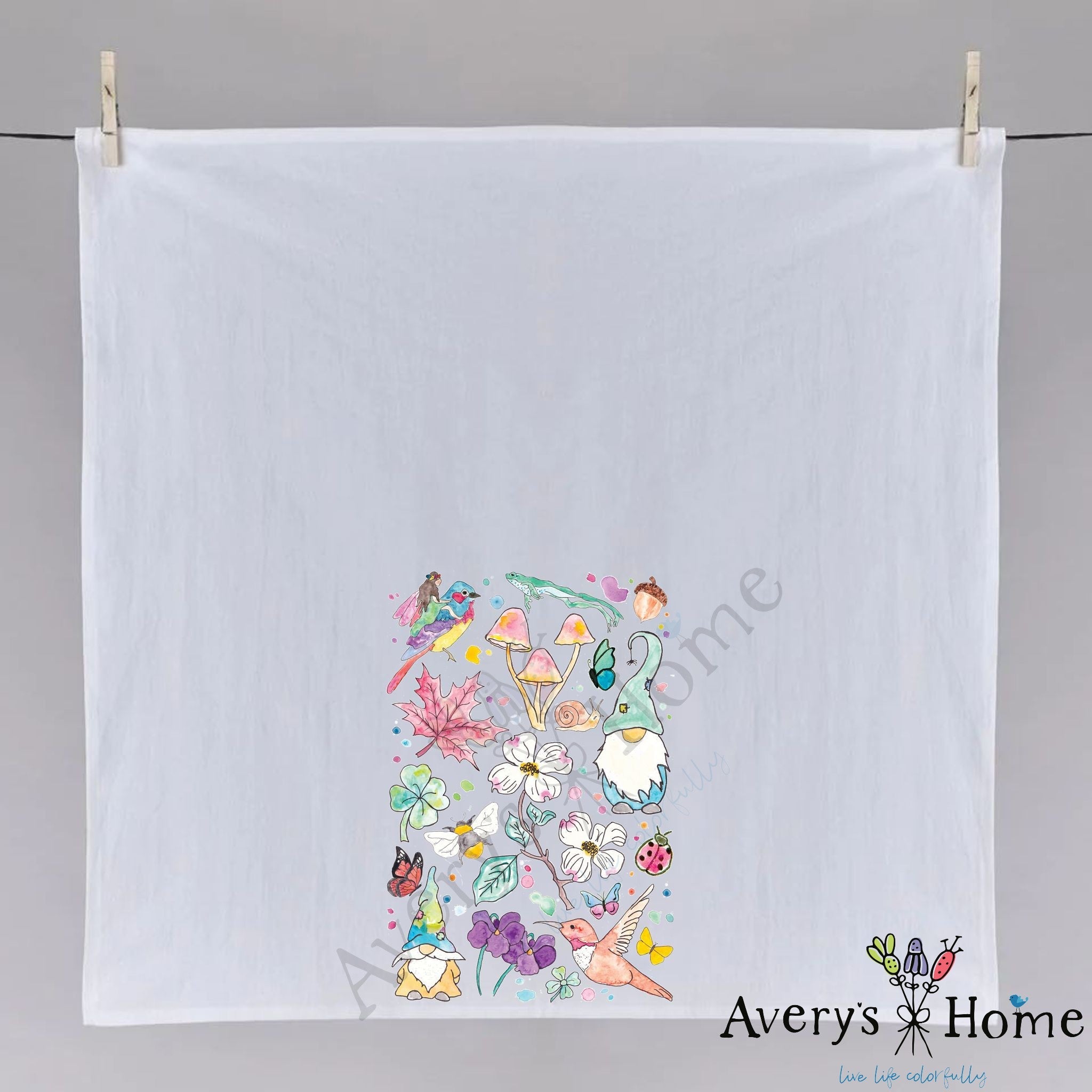Garden Gnomes and Mushrooms dish towel hanging in the kitchen