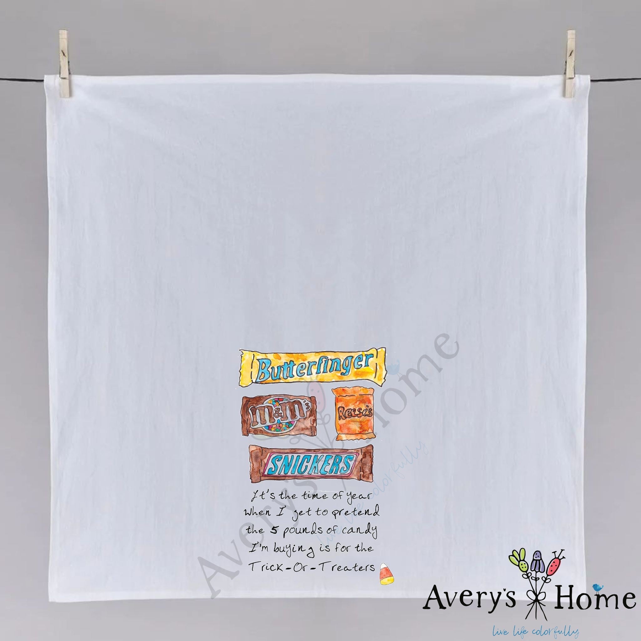 Candy for Halloween dish towel hanging in the kitchen