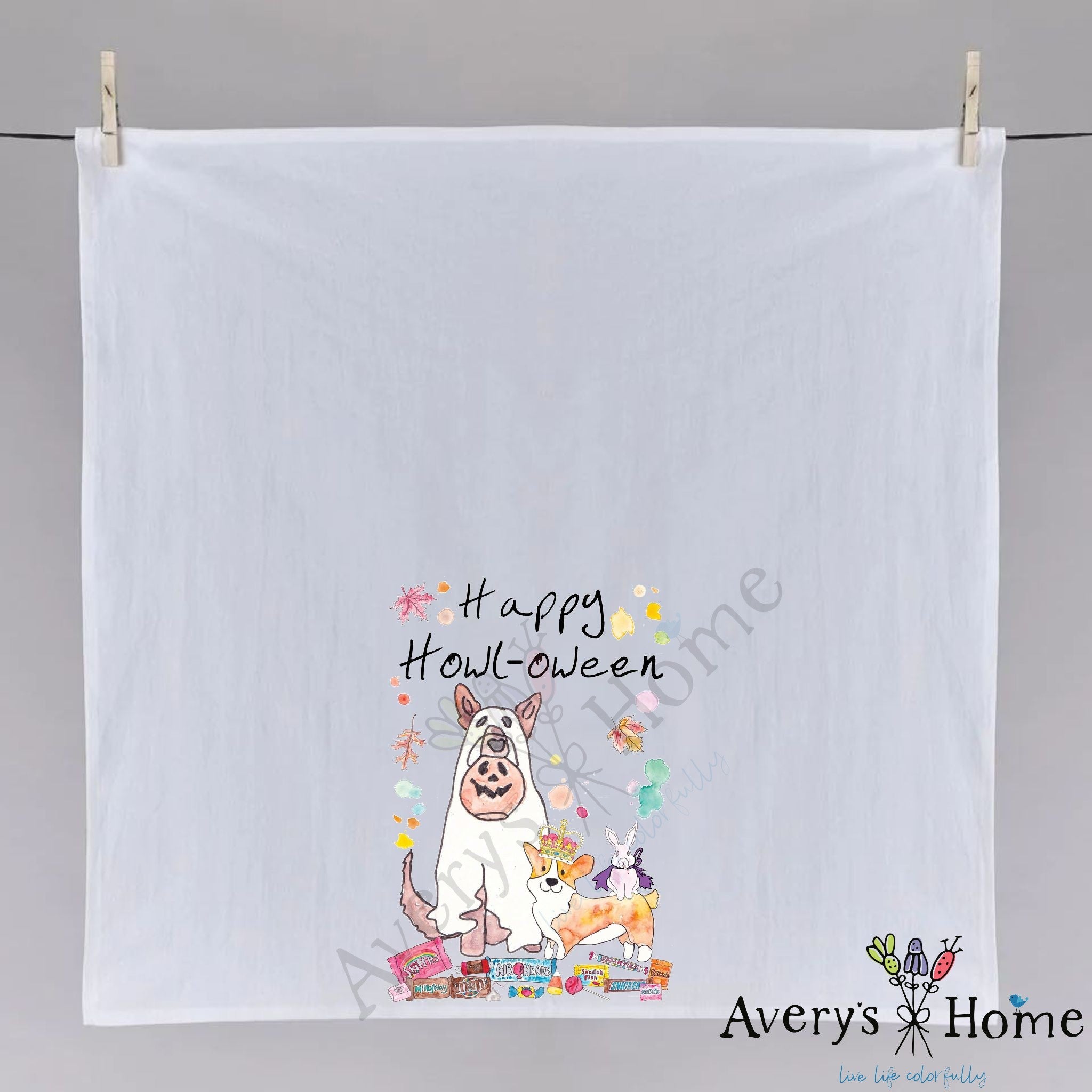 Happy Halloween with Dogs dish towel hanging in the kitchen