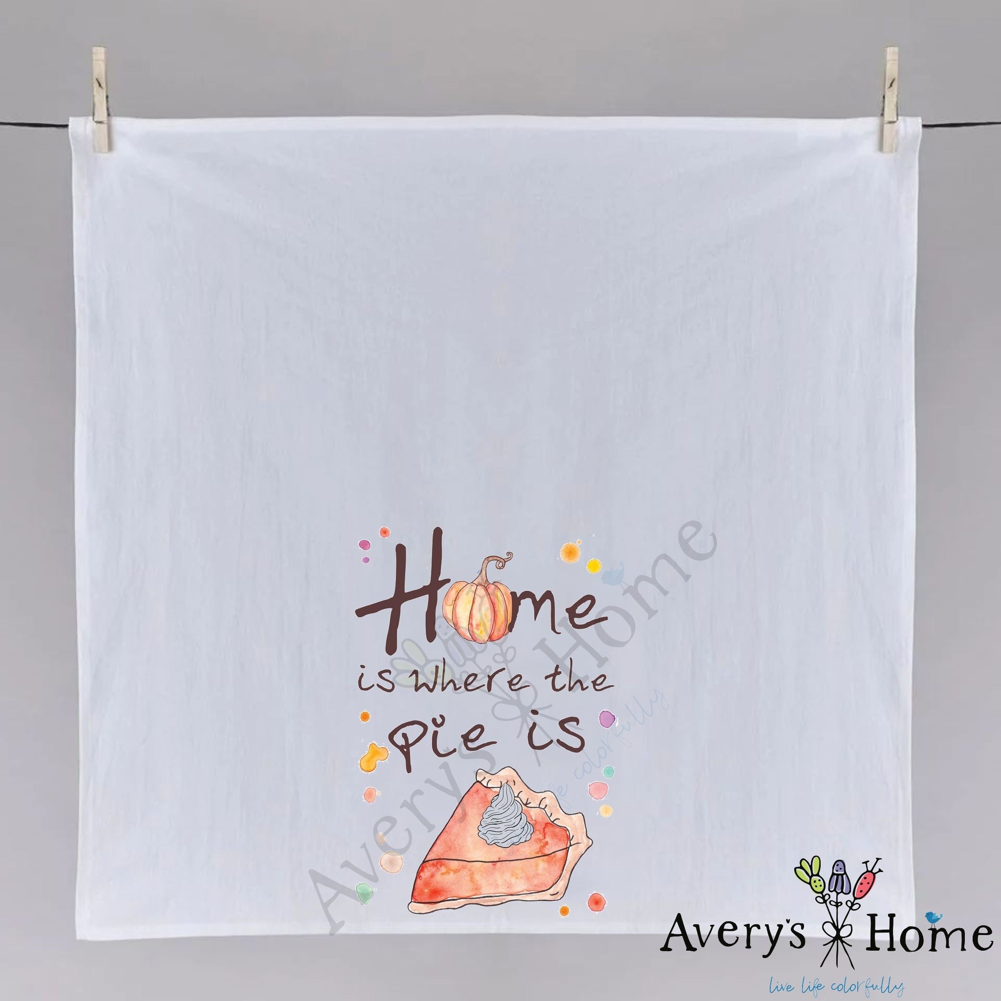 Home is Where the Pie is Thanksgiving dish towel hanging in the kitchen