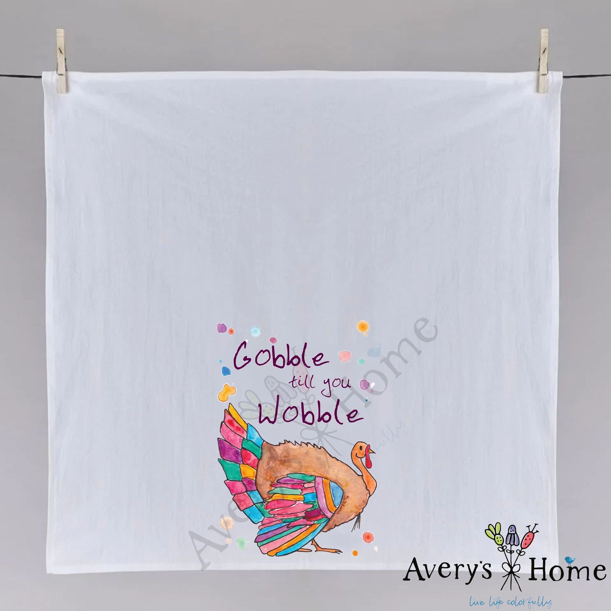 Gobble Till You Wobble dish towel hanging in the kitchen