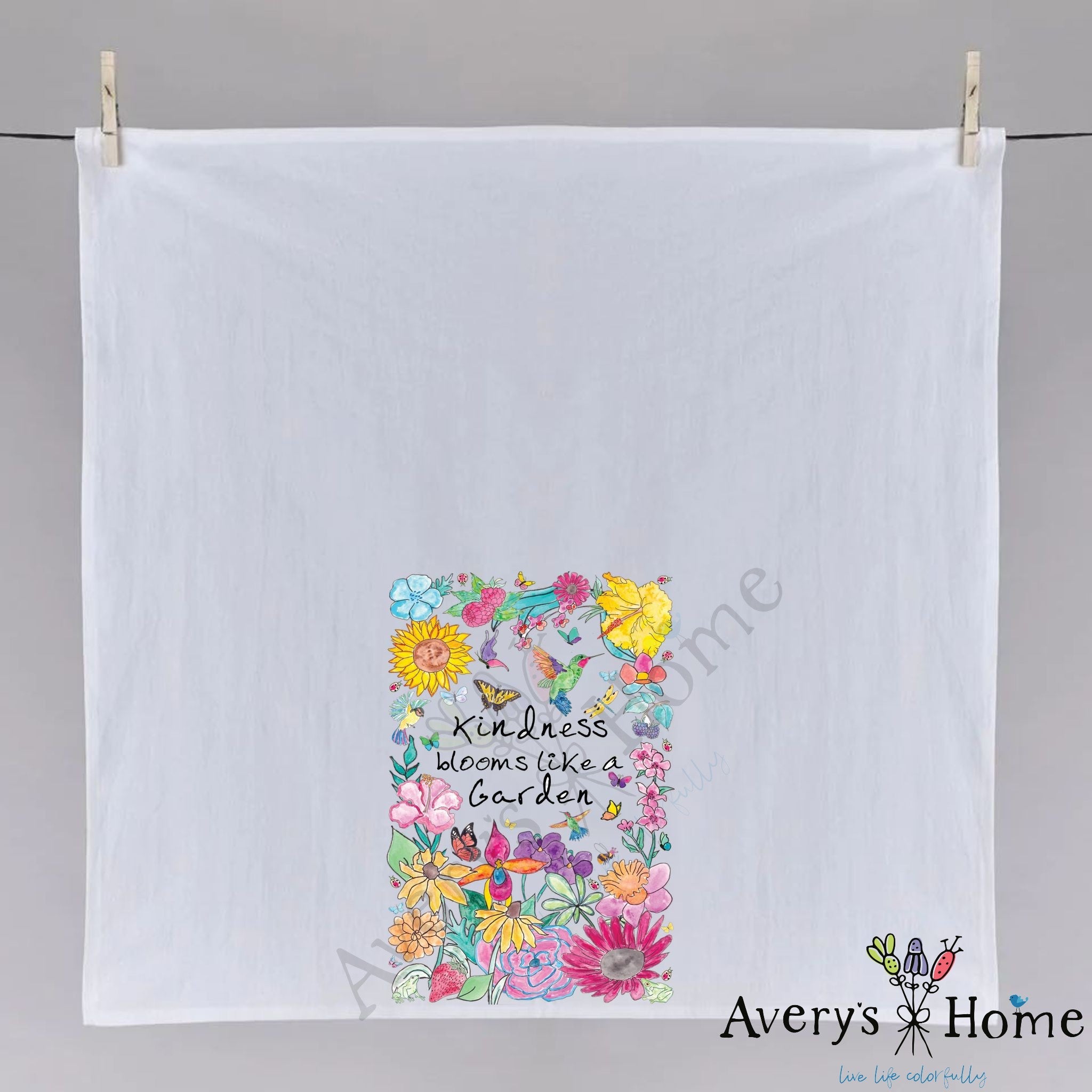 Kindness Blooms Garden dish towel hanging in the kitchen
