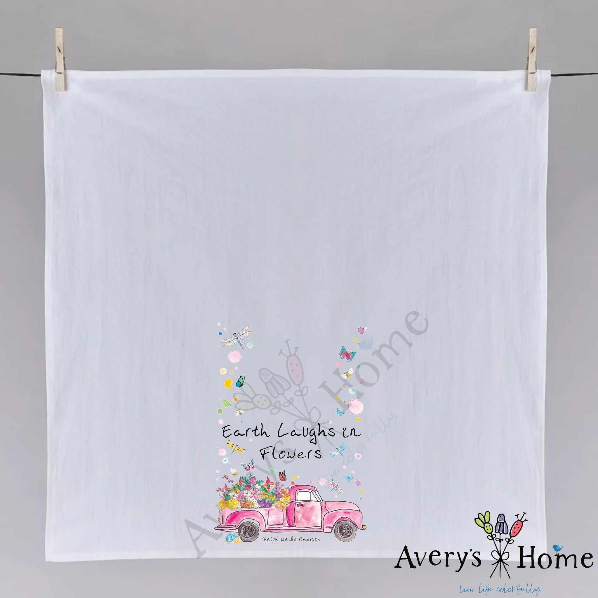 Earth Laughs in Flowers dish towel hanging in the kitchen