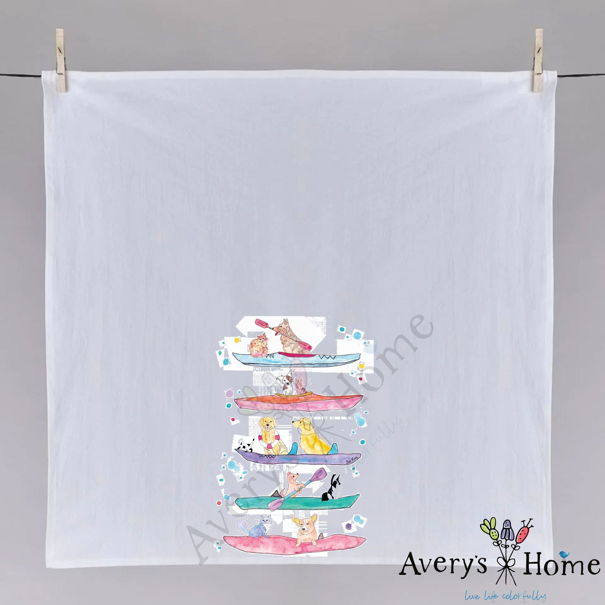 Dogs Kayaking dish towel hanging in the kitchen