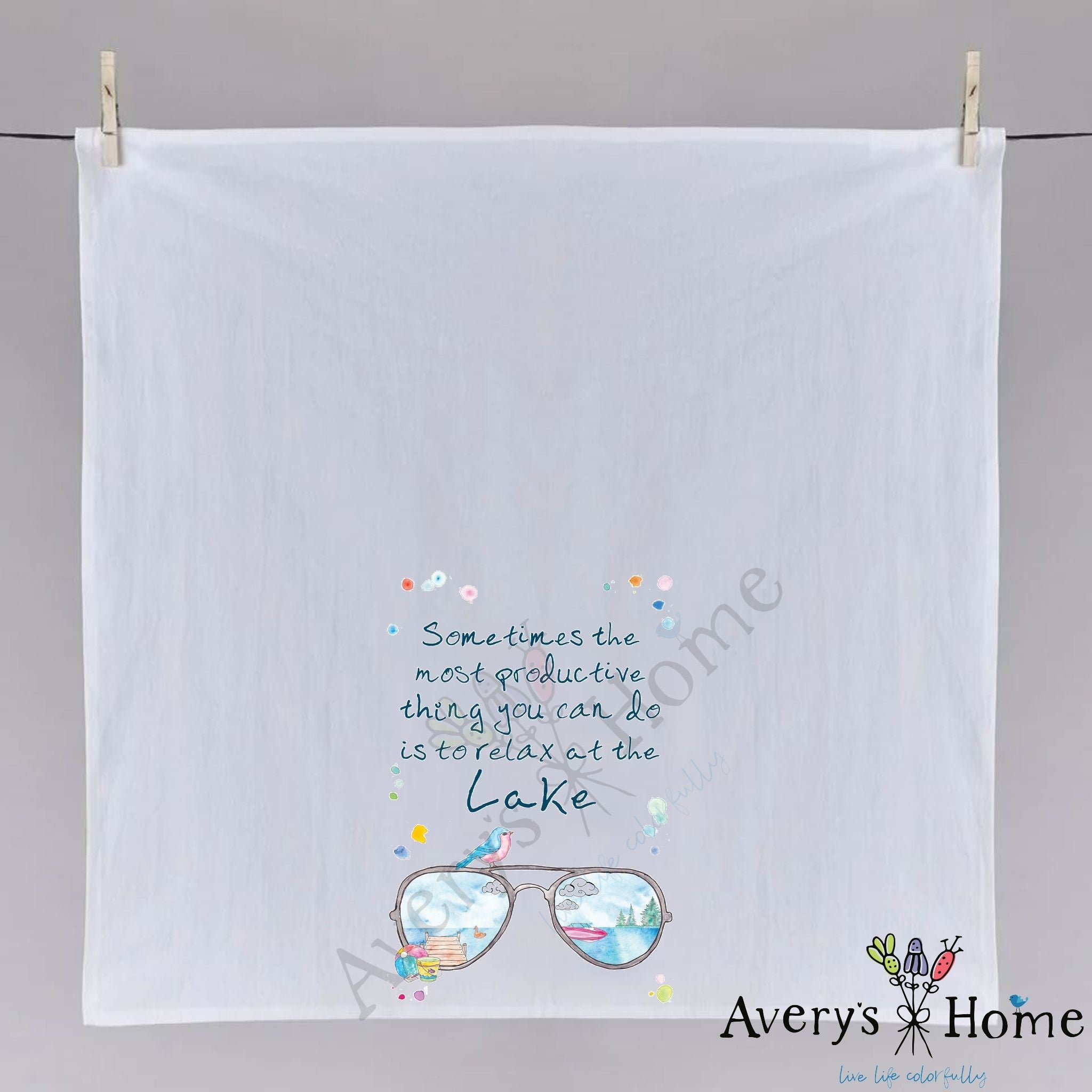 Sunglasses Relax at the Lake dish towel hanging in the kitchen