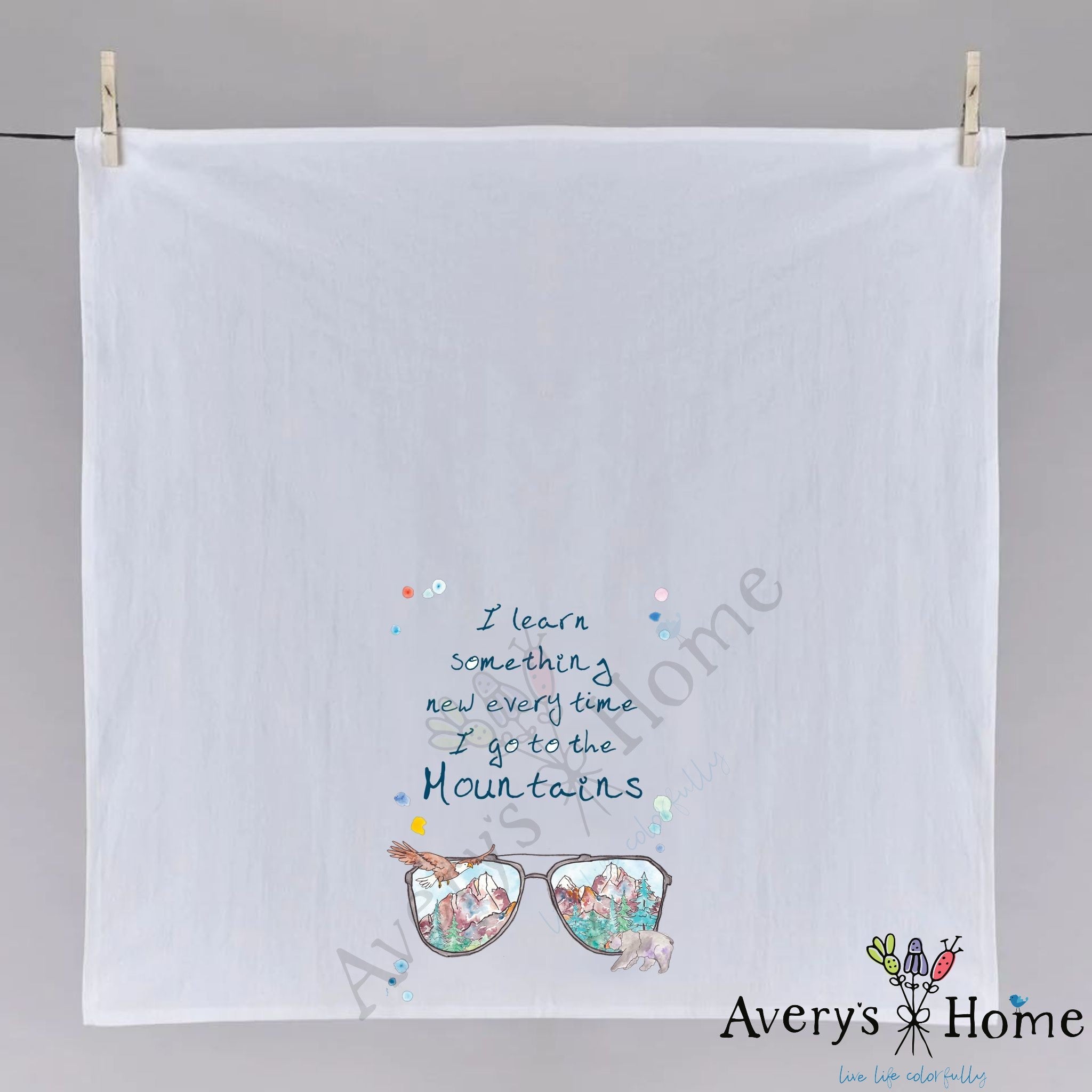 Mountain Sunglasses Vacation dish towel hanging in the kitchen