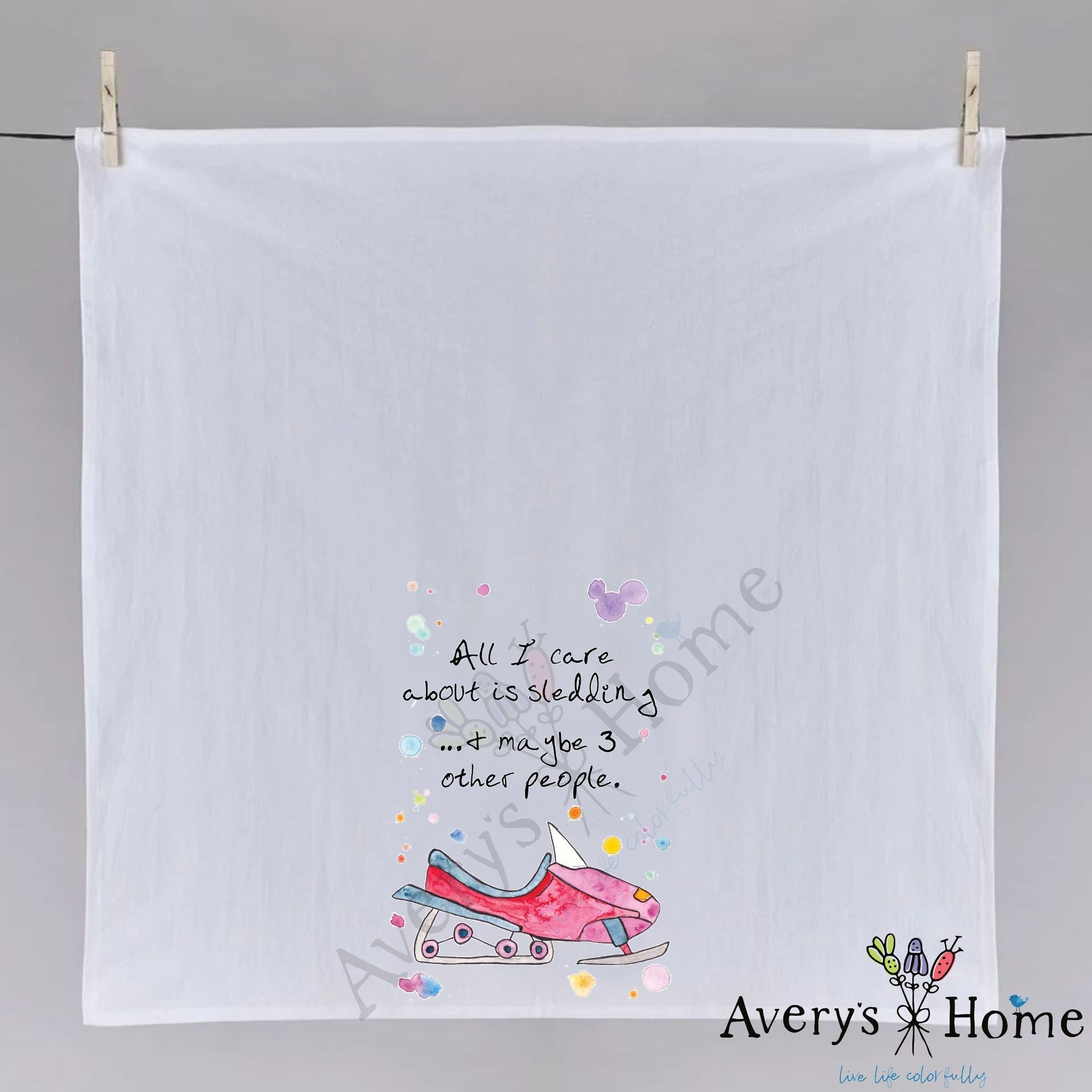 Sledding People dish towel folded, hemmed on all four sides
