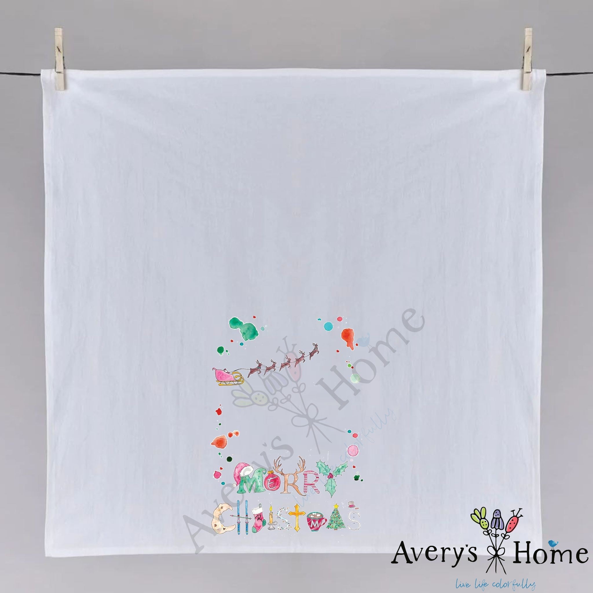 Merry Christmas dish towel hanging in the kitchen