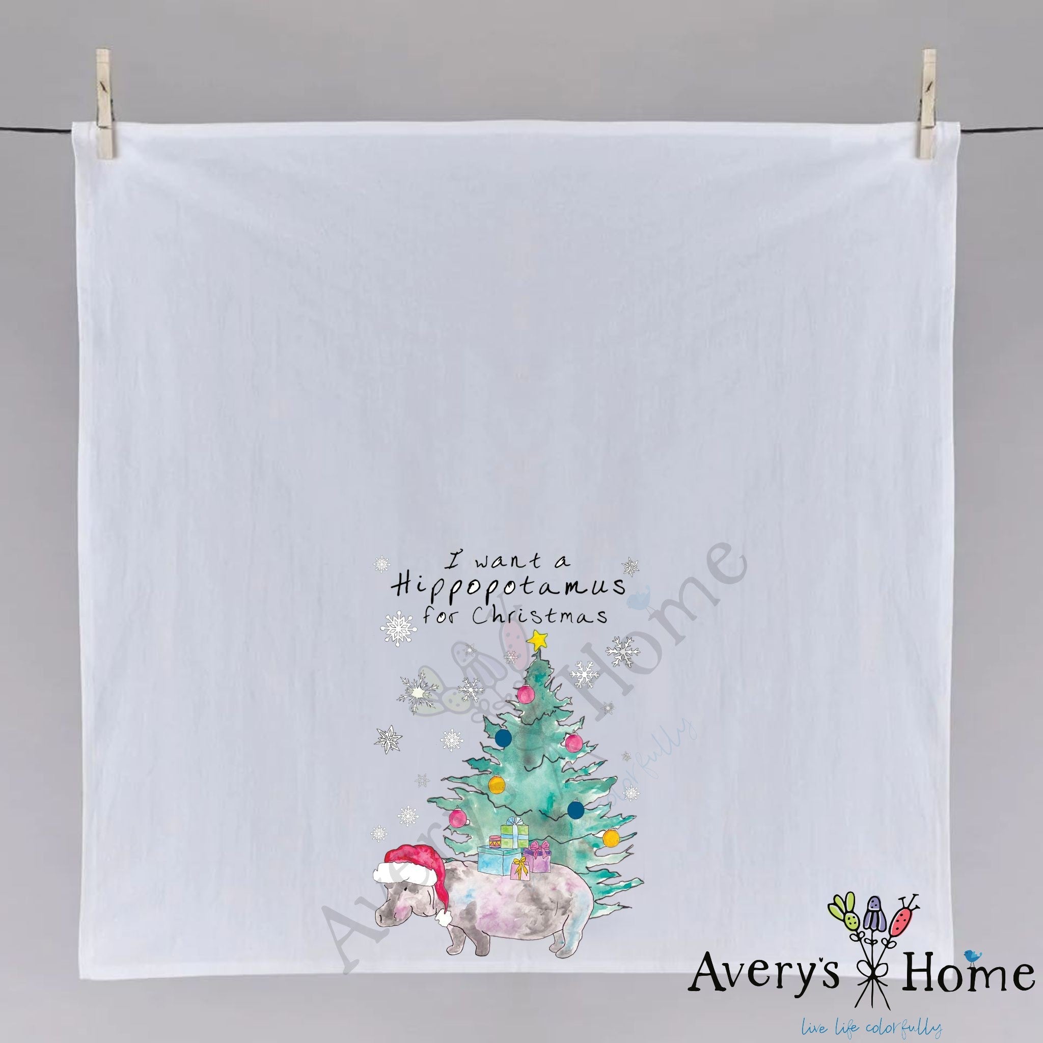 Hippo for Christmas dish towel hanging in the kitchen