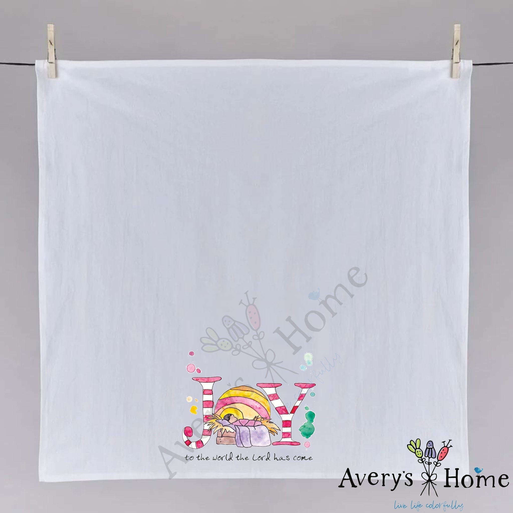 Christmas Nativity Joy dish towel hanging in the kitchen