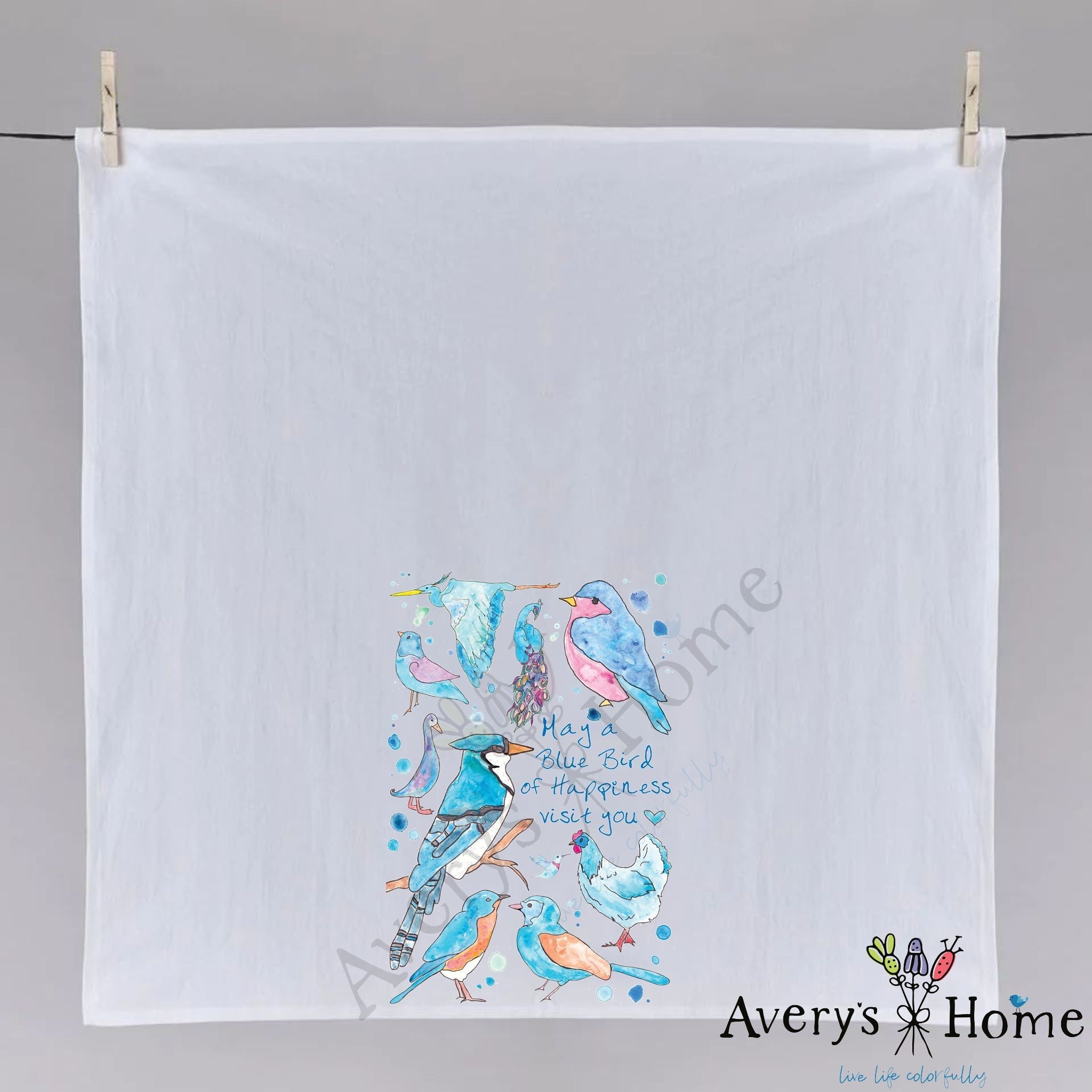 Blue Birds of Happiness dish towel hanging in the kitchen