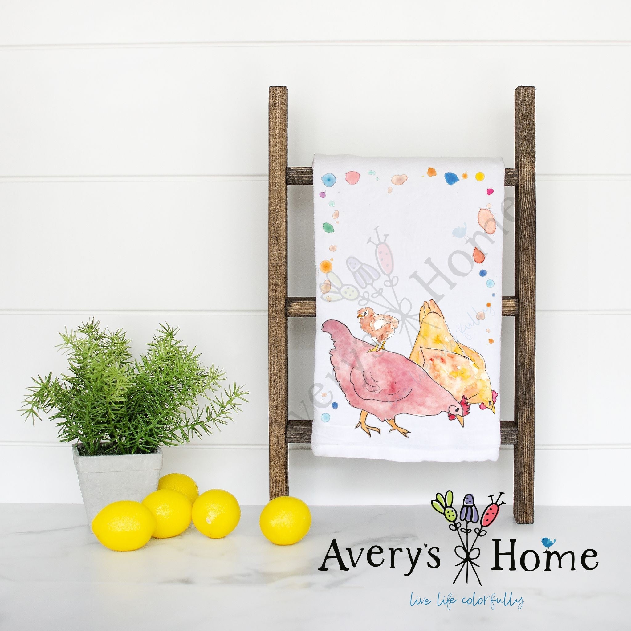 Chickens dish towel hanging by kitchen sink