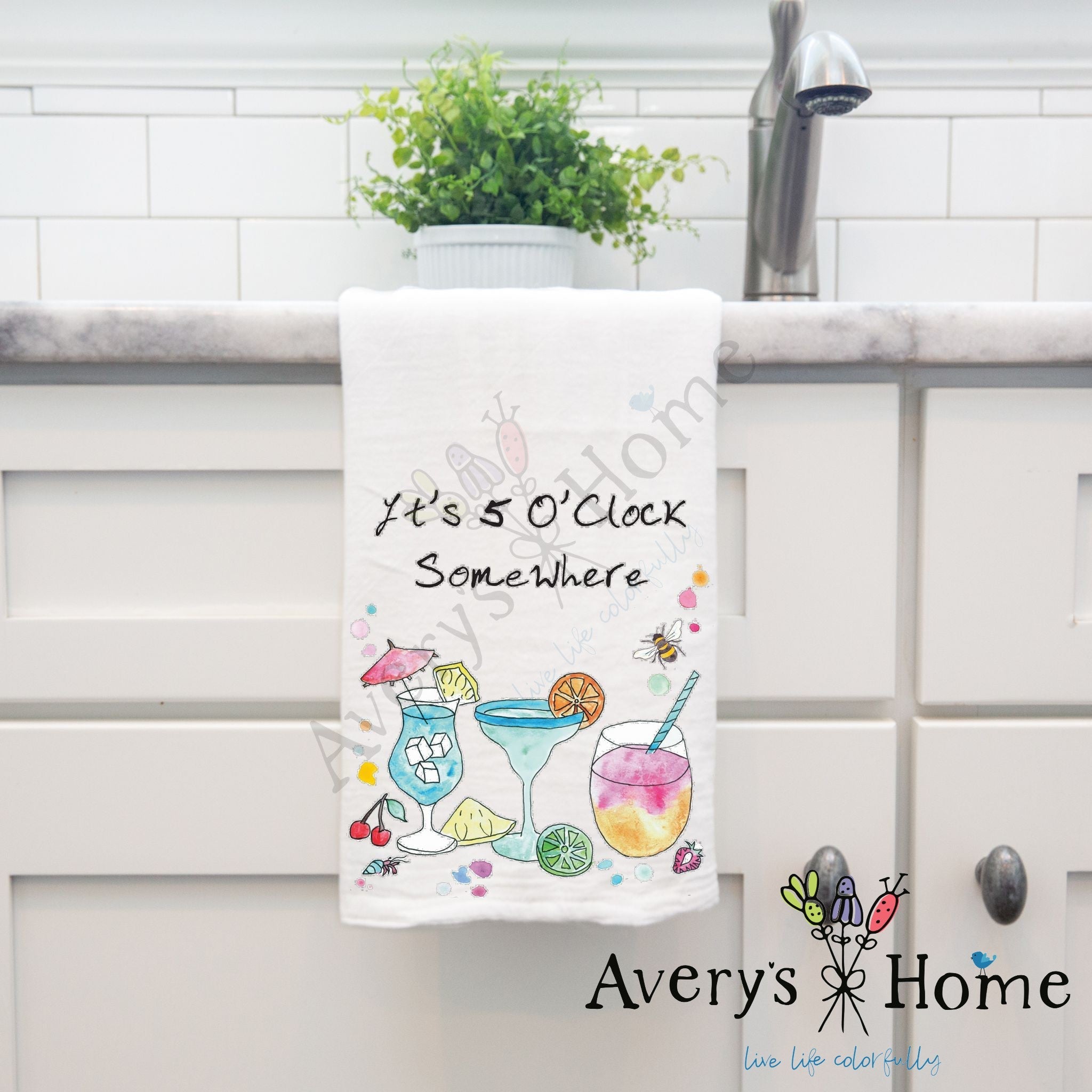 5 O'Clock Somewhere dish towel hanging by kitchen sink